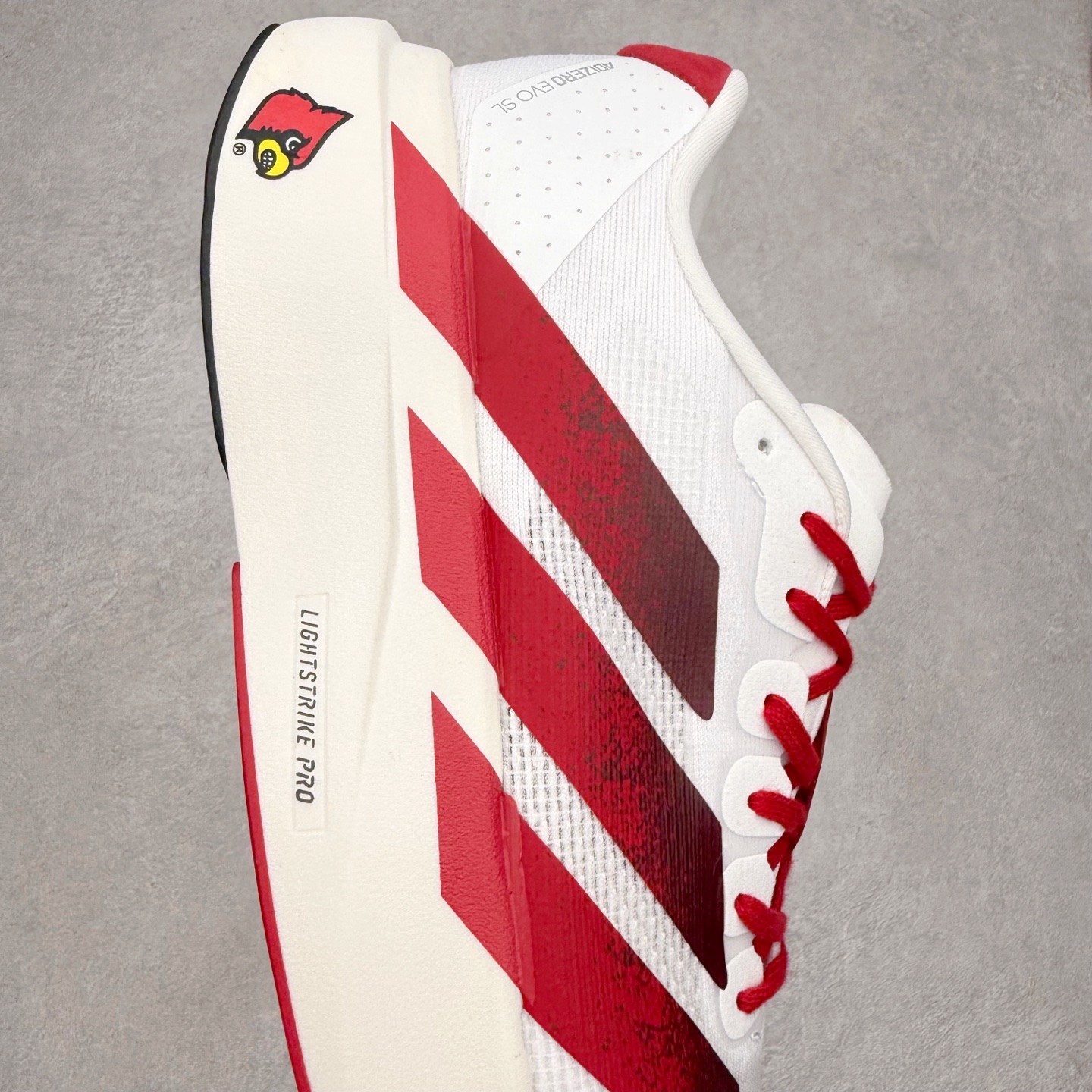 图片[6]-AD Adizero EVO SL 马拉松竞速专业跑鞋 JQ4567 CELERMESH针织网面非常轻薄 纤维间的缝隙很大 可以保证跑步时的透气、排汗效果 鞋舌直接与两侧的内衬和鞋底连接在一起 在跑步过程中不会被鞋舌的左右移动所困扰 在标准鞋带孔的基础上再拓宽一组鞋带孔 适合不同脚型的需求 突破性 EnergyRods 技术，有助于跑者实现更好的成绩 中底独特的LIGHTSTRIKE PRO泡棉材质 微弹感觉在跑步过程中给予了良好的支撑体验 对于顶级精英和高水平进阶跑者来说 ADIOS PRO是一双值得信赖的竞速比赛用鞋 尺码：36 36.5 37.5 38 38.5 39 40 40.5 41 42 42.5 43 44 44.5 45-选品中心