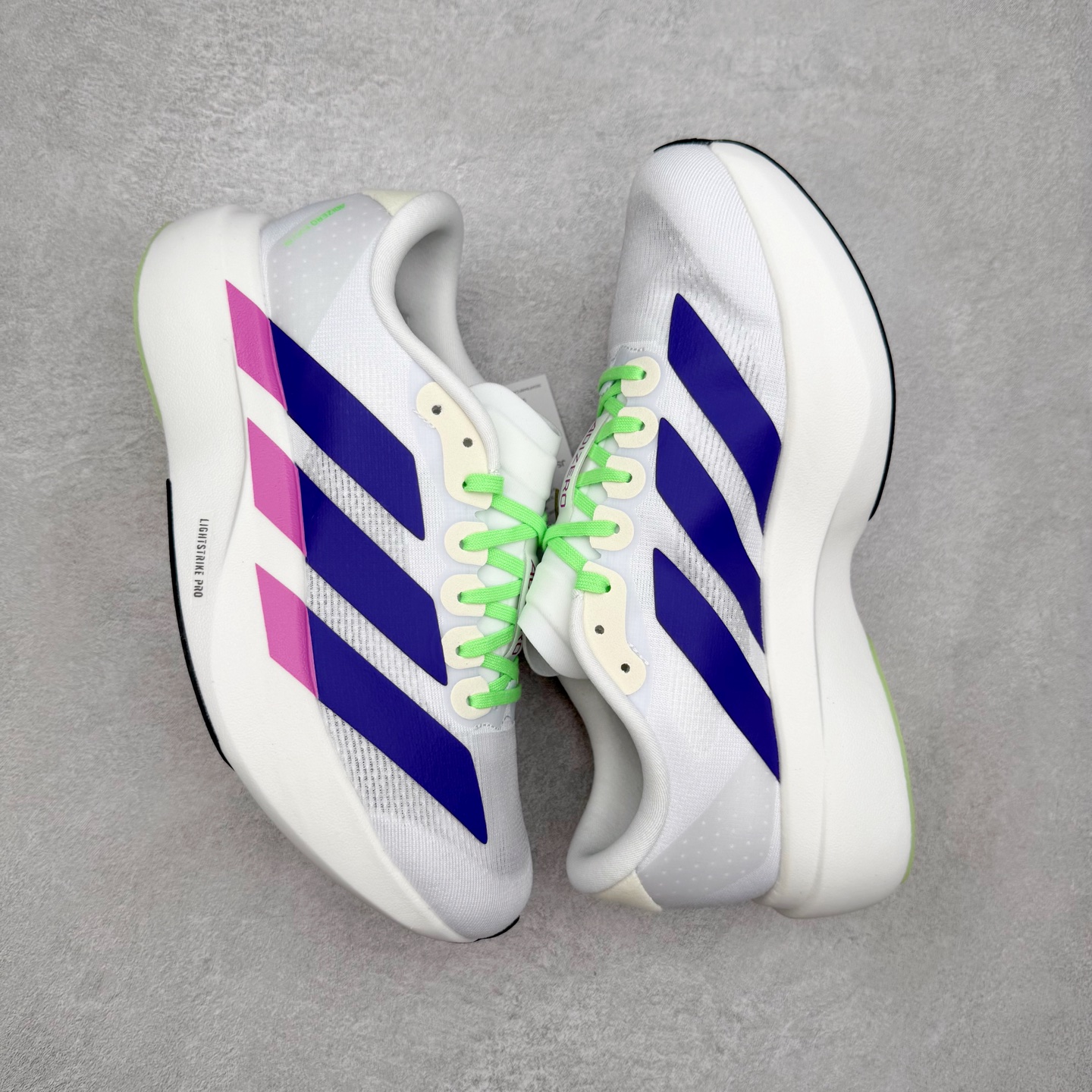 图片[3]-AD Adizero EVO SL 马拉松竞速专业跑鞋 JS4456 CELERMESH针织网面非常轻薄 纤维间的缝隙很大 可以保证跑步时的透气、排汗效果 鞋舌直接与两侧的内衬和鞋底连接在一起 在跑步过程中不会被鞋舌的左右移动所困扰 在标准鞋带孔的基础上再拓宽一组鞋带孔 适合不同脚型的需求 突破性 EnergyRods 技术，有助于跑者实现更好的成绩 中底独特的LIGHTSTRIKE PRO泡棉材质 微弹感觉在跑步过程中给予了良好的支撑体验 对于顶级精英和高水平进阶跑者来说 ADIOS PRO是一双值得信赖的竞速比赛用鞋 尺码：36 36.5 37.5 38 38.5 39 40 40.5 41 42 42.5 43 44 44.5 45-选品中心