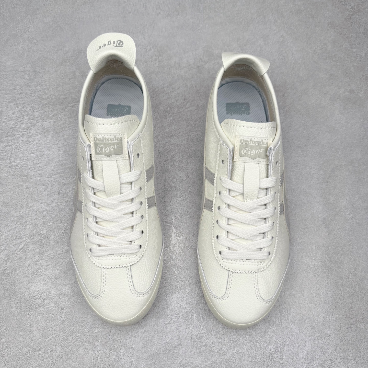 图片[2]-＃C版 Asics Onitsuka Tiger MEXICO 66 亚瑟士鬼冢虎复古经典板鞋 市场王者选手 海外订单工厂出品 长期生产补货永不断码 超成熟稳定的做工品控 原装全套纸板楦头开发 原汁原味 完美呈现版型 私模正确鞋底咬花纹路 一比一鞋头弧度高度鞋身弧度 绝不口嗨 细节品控鞋型随意秒杀市面 原档咬花纹路私模大底 一个单元有六个三角形 总体形拼接呈现花瓣状 官方四联吊牌 原装Ortholite轻量化鞋垫 原盒原配 质保卡 说明书 钢印防尘纸 纸板中底带钢印 乳胶组合鞋垫 支持全方位的对比专柜 产品从款式颜色造型上体现出追求舒适和细节的完美 鞋类更是推崇手工制作的严谨与完美 融舒适性与可穿性的设计风格 注重细节的完美和别致魅力 既保持稳重 又不失轻松的时尚感 尺码：36 37 37.5 38 39 39.5 40 40.5 41.5 42 42.5 43.5 44 45-选品中心