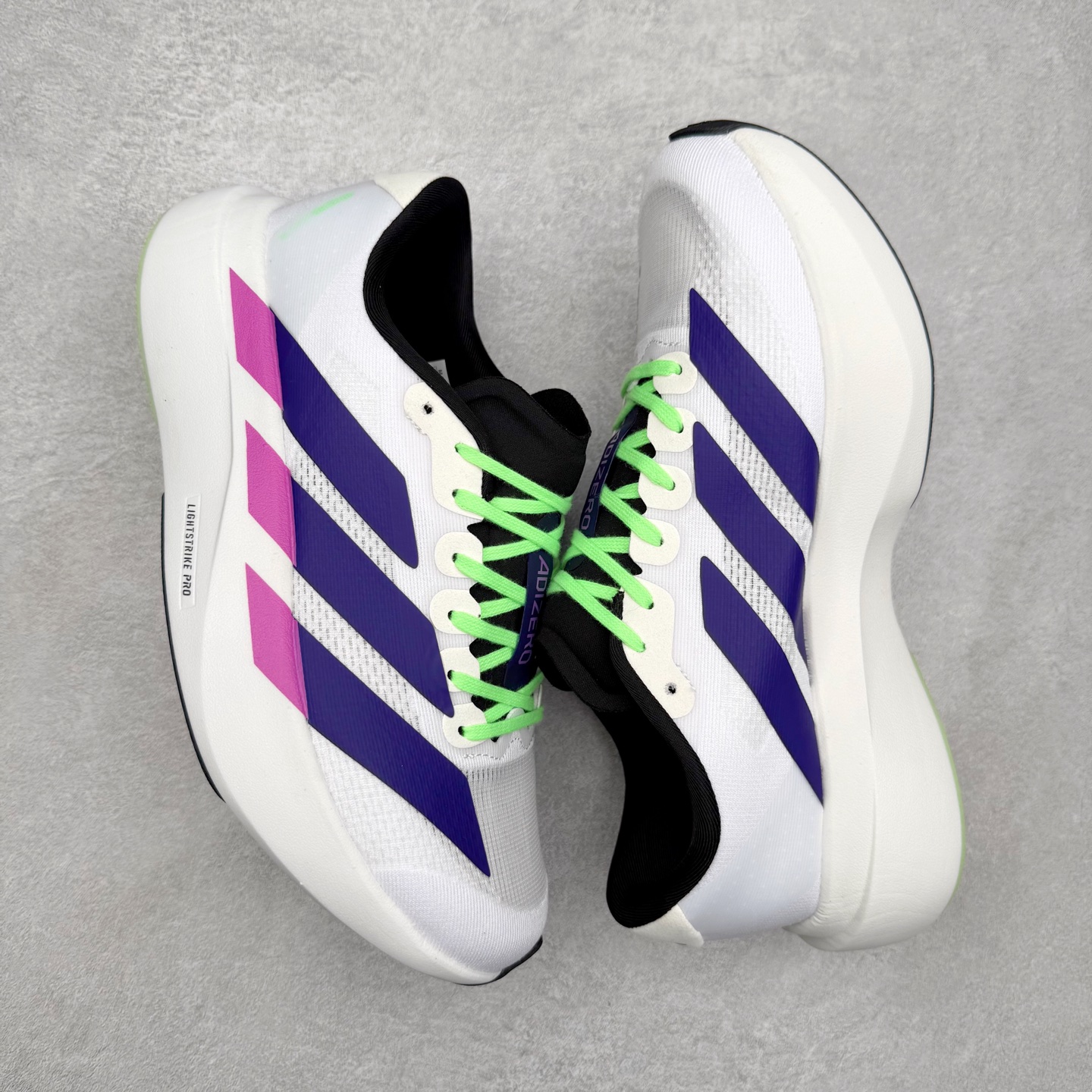 图片[3]-AD Adizero EVO SL 马拉松竞速专业跑鞋 JS4495 CELERMESH针织网面非常轻薄 纤维间的缝隙很大 可以保证跑步时的透气、排汗效果 鞋舌直接与两侧的内衬和鞋底连接在一起 在跑步过程中不会被鞋舌的左右移动所困扰 在标准鞋带孔的基础上再拓宽一组鞋带孔 适合不同脚型的需求 突破性 EnergyRods 技术，有助于跑者实现更好的成绩 中底独特的LIGHTSTRIKE PRO泡棉材质 微弹感觉在跑步过程中给予了良好的支撑体验 对于顶级精英和高水平进阶跑者来说 ADIOS PRO是一双值得信赖的竞速比赛用鞋 尺码：36 36.5 37.5 38 38.5 39 40 40.5 41 42 42.5 43 44 44.5 45-选品中心