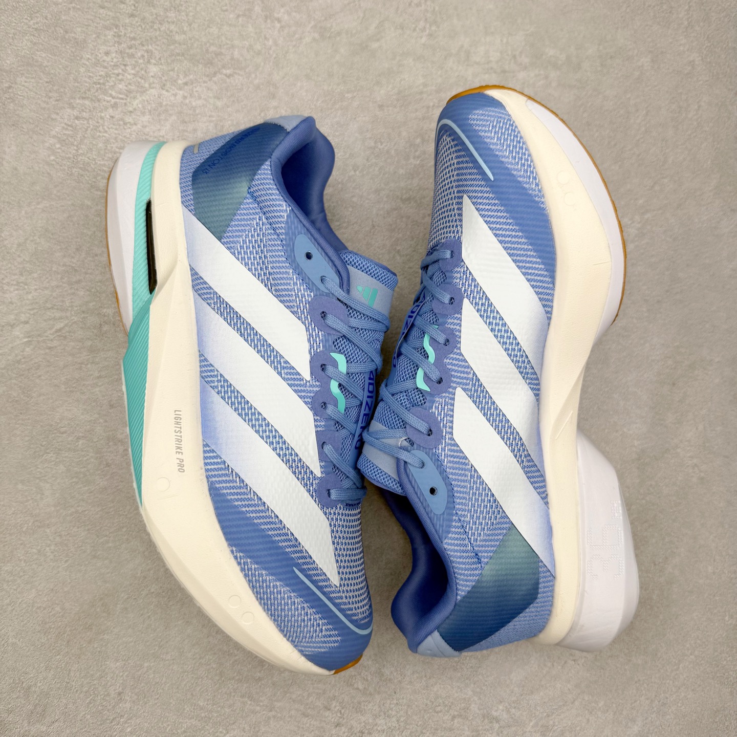 图片[3]-AD Adizero Boston 13 夏季透气网眼竞速跑鞋 JS4956 融合Lightstrike和Lightstrike Pro技术 采用乙烯/乙酸乙烯酯(EVA)材质 打造舒适中底 含ENERGYROD能量碳柱 旨在为步伐添活力 尺码：36 36.5 37 38 38.5 39 40 40.5 41 42 42.5 43 44 44.5 45-选品中心