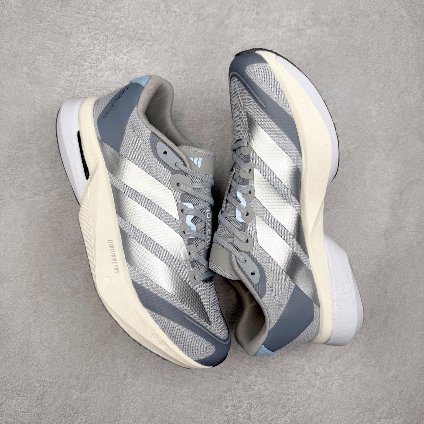 图片[3]-AD Adizero Boston 13 夏季透气网眼竞速跑鞋 JS4949 融合Lightstrike和Lightstrike Pro技术 采用乙烯/乙酸乙烯酯(EVA)材质 打造舒适中底 含ENERGYROD能量碳柱 旨在为步伐添活力 尺码：36 36.5 37 38 38.5 39 40 40.5 41 42 42.5 43 44 44.5 45-选品中心