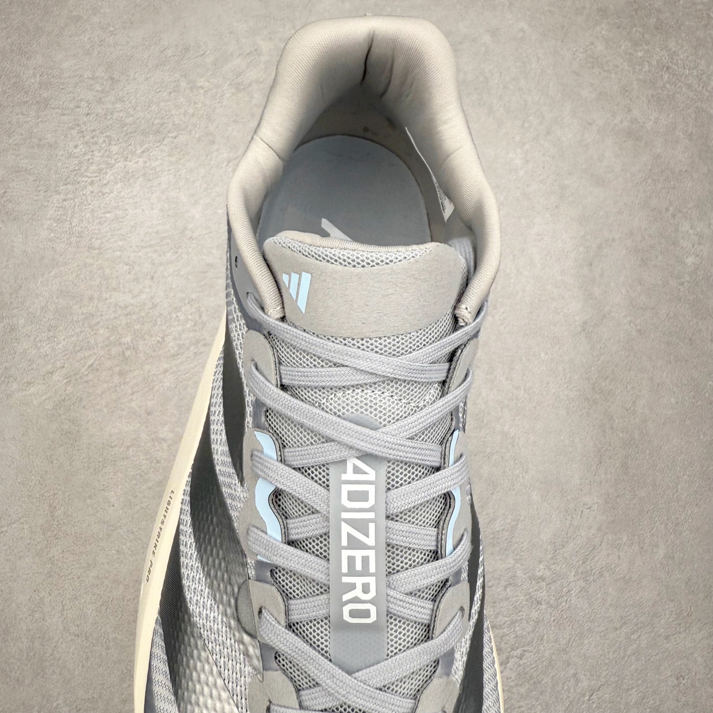 图片[5]-AD Adizero Boston 13 夏季透气网眼竞速跑鞋 JS4949 融合Lightstrike和Lightstrike Pro技术 采用乙烯/乙酸乙烯酯(EVA)材质 打造舒适中底 含ENERGYROD能量碳柱 旨在为步伐添活力 尺码：36 36.5 37 38 38.5 39 40 40.5 41 42 42.5 43 44 44.5 45-选品中心