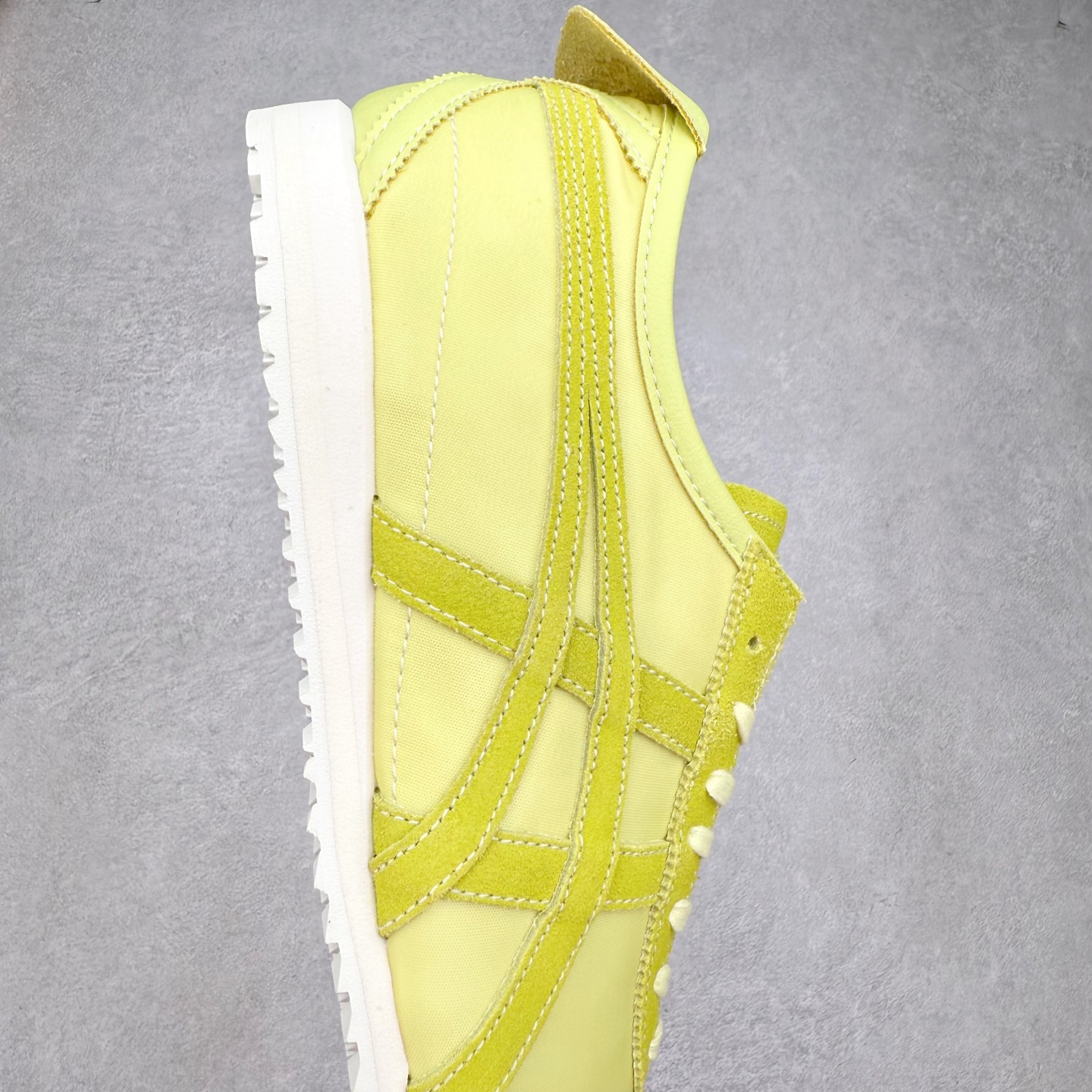 图片[6]-＃C版 Asics Onitsuka Tiger MEXICO 66 亚瑟士鬼冢虎复古经典板鞋 市场王者选手 海外订单工厂出品 长期生产补货永不断码 超成熟稳定的做工品控 原装全套纸板楦头开发 原汁原味 完美呈现版型 私模正确鞋底咬花纹路 一比一鞋头弧度高度鞋身弧度 绝不口嗨 细节品控鞋型随意秒杀市面 原档咬花纹路私模大底 一个单元有六个三角形 总体形拼接呈现花瓣状 官方四联吊牌 原装Ortholite轻量化鞋垫 原盒原配 质保卡 说明书 钢印防尘纸 纸板中底带钢印 乳胶组合鞋垫 支持全方位的对比专柜 产品从款式颜色造型上体现出追求舒适和细节的完美 鞋类更是推崇手工制作的严谨与完美 融舒适性与可穿性的设计风格 注重细节的完美和别致魅力 既保持稳重 又不失轻松的时尚感 尺码：36 37 37.5 38 39 39.5 40 40.5 41.5 42 42.5 43.5 44 45-选品中心