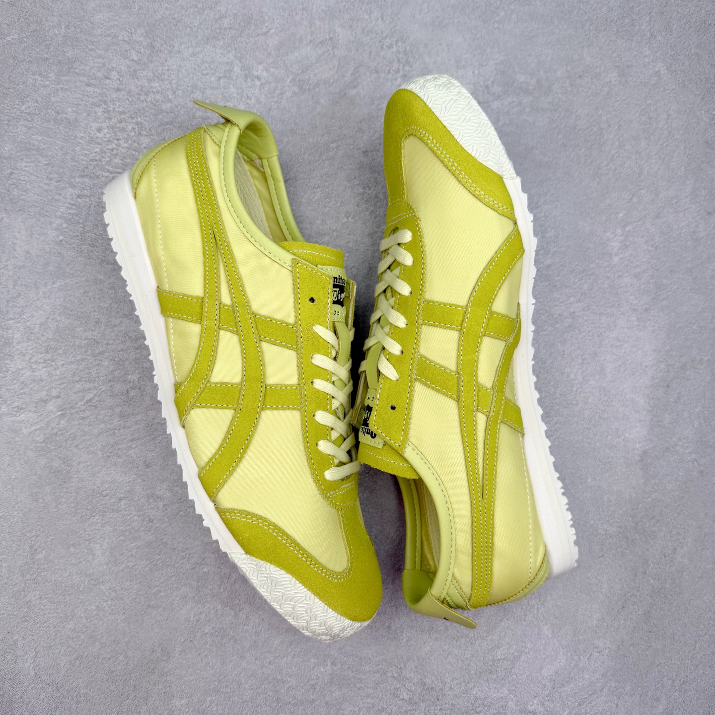 图片[3]-＃C版 Asics Onitsuka Tiger MEXICO 66 亚瑟士鬼冢虎复古经典板鞋 市场王者选手 海外订单工厂出品 长期生产补货永不断码 超成熟稳定的做工品控 原装全套纸板楦头开发 原汁原味 完美呈现版型 私模正确鞋底咬花纹路 一比一鞋头弧度高度鞋身弧度 绝不口嗨 细节品控鞋型随意秒杀市面 原档咬花纹路私模大底 一个单元有六个三角形 总体形拼接呈现花瓣状 官方四联吊牌 原装Ortholite轻量化鞋垫 原盒原配 质保卡 说明书 钢印防尘纸 纸板中底带钢印 乳胶组合鞋垫 支持全方位的对比专柜 产品从款式颜色造型上体现出追求舒适和细节的完美 鞋类更是推崇手工制作的严谨与完美 融舒适性与可穿性的设计风格 注重细节的完美和别致魅力 既保持稳重 又不失轻松的时尚感 尺码：36 37 37.5 38 39 39.5 40 40.5 41.5 42 42.5 43.5 44 45-选品中心