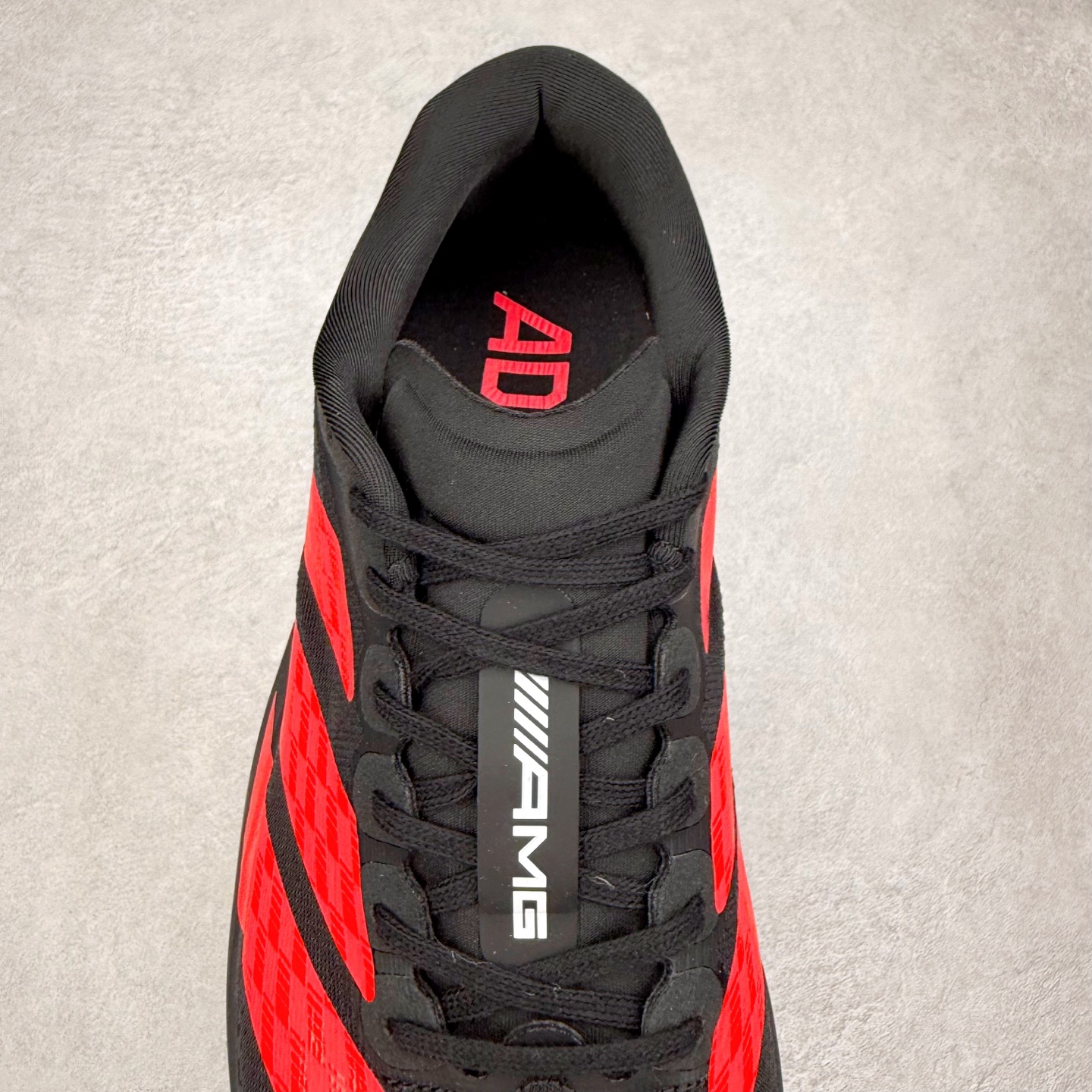 图片[5]-AD Adizero EVO SL 马拉松竞速专业跑鞋 CELERMESH针织网面非常轻薄 纤维间的缝隙很大 可以保证跑步时的透气、排汗效果 鞋舌直接与两侧的内衬和鞋底连接在一起 在跑步过程中不会被鞋舌的左右移动所困扰 在标准鞋带孔的基础上再拓宽一组鞋带孔 适合不同脚型的需求 突破性 EnergyRods 技术，有助于跑者实现更好的成绩 中底独特的LIGHTSTRIKE PRO泡棉材质 微弹感觉在跑步过程中给予了良好的支撑体验 对于顶级精英和高水平进阶跑者来说 ADIOS PRO是一双值得信赖的竞速比赛用鞋 尺码：36 36.5 37.5 38 38.5 39 40 40.5 41 42 42.5 43 44 44.5 45-选品中心