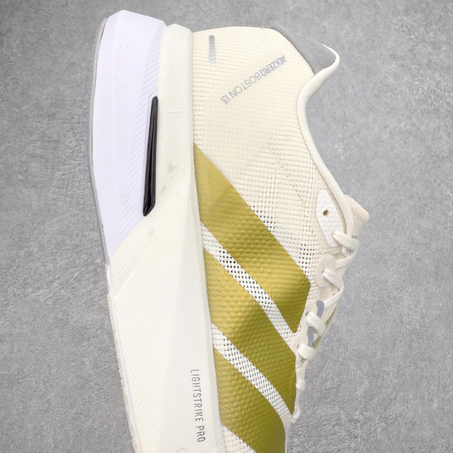 图片[6]-AD Adizero Boston 13 夏季透气网眼竞速跑鞋 JS4947 融合Lightstrike和Lightstrike Pro技术 采用乙烯/乙酸乙烯酯(EVA)材质 打造舒适中底 含ENERGYROD能量碳柱 旨在为步伐添活力 尺码：36 36.5 37 38 38.5 39 40 40.5 41 42 42.5 43 44 44.5 45-选品中心