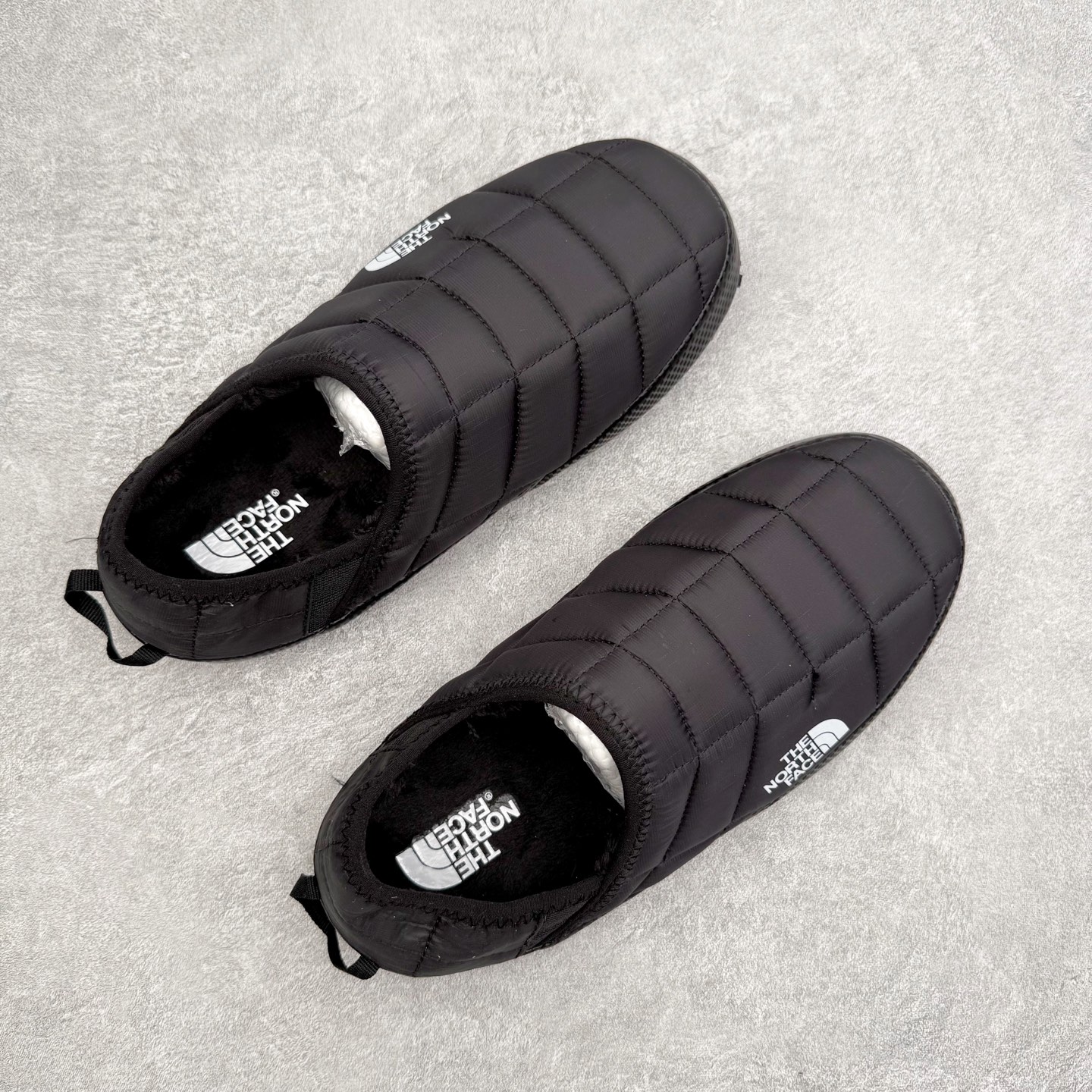 图片[3]-THE NORTH FACE 北面一脚蹬超轻保暖面包棉鞋 专业户外登山品牌（北面）The North Face自1966年创立，由两位热爱登山徒步的年轻登山者于美西旧金山开创，不断透过研发与创新，并且将最先进的技术结合在服装与鞋款设计，生产多种外型帅气且专业能力非常强的户外运动装备而备受欢迎。尺码：36 36.5 37.5 38 38.5 39 40 40.5 41 42 42.5 43 44 44.5 45-选品中心