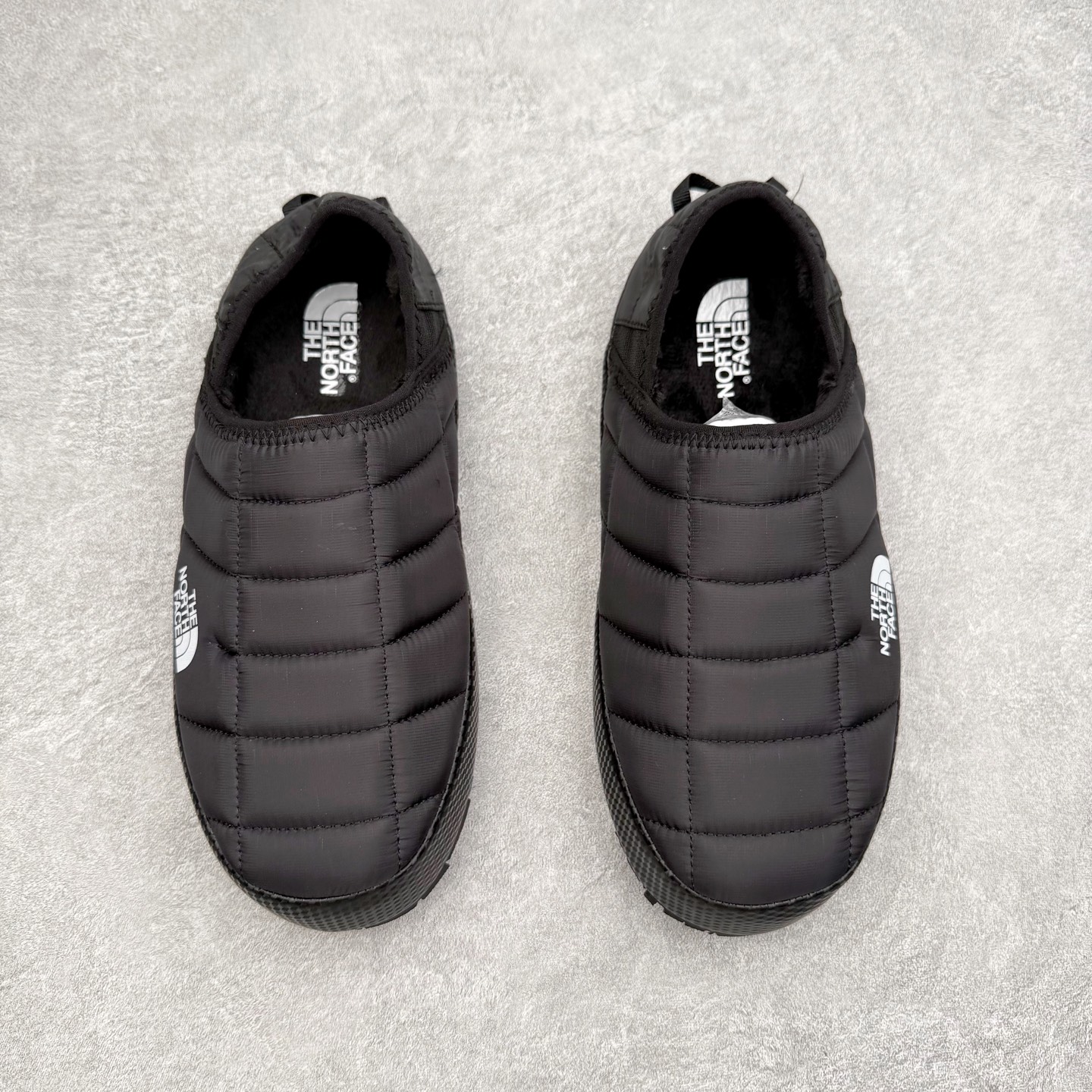 图片[2]-THE NORTH FACE 北面一脚蹬超轻保暖面包棉鞋 专业户外登山品牌（北面）The North Face自1966年创立，由两位热爱登山徒步的年轻登山者于美西旧金山开创，不断透过研发与创新，并且将最先进的技术结合在服装与鞋款设计，生产多种外型帅气且专业能力非常强的户外运动装备而备受欢迎。尺码：36 36.5 37.5 38 38.5 39 40 40.5 41 42 42.5 43 44 44.5 45-选品中心