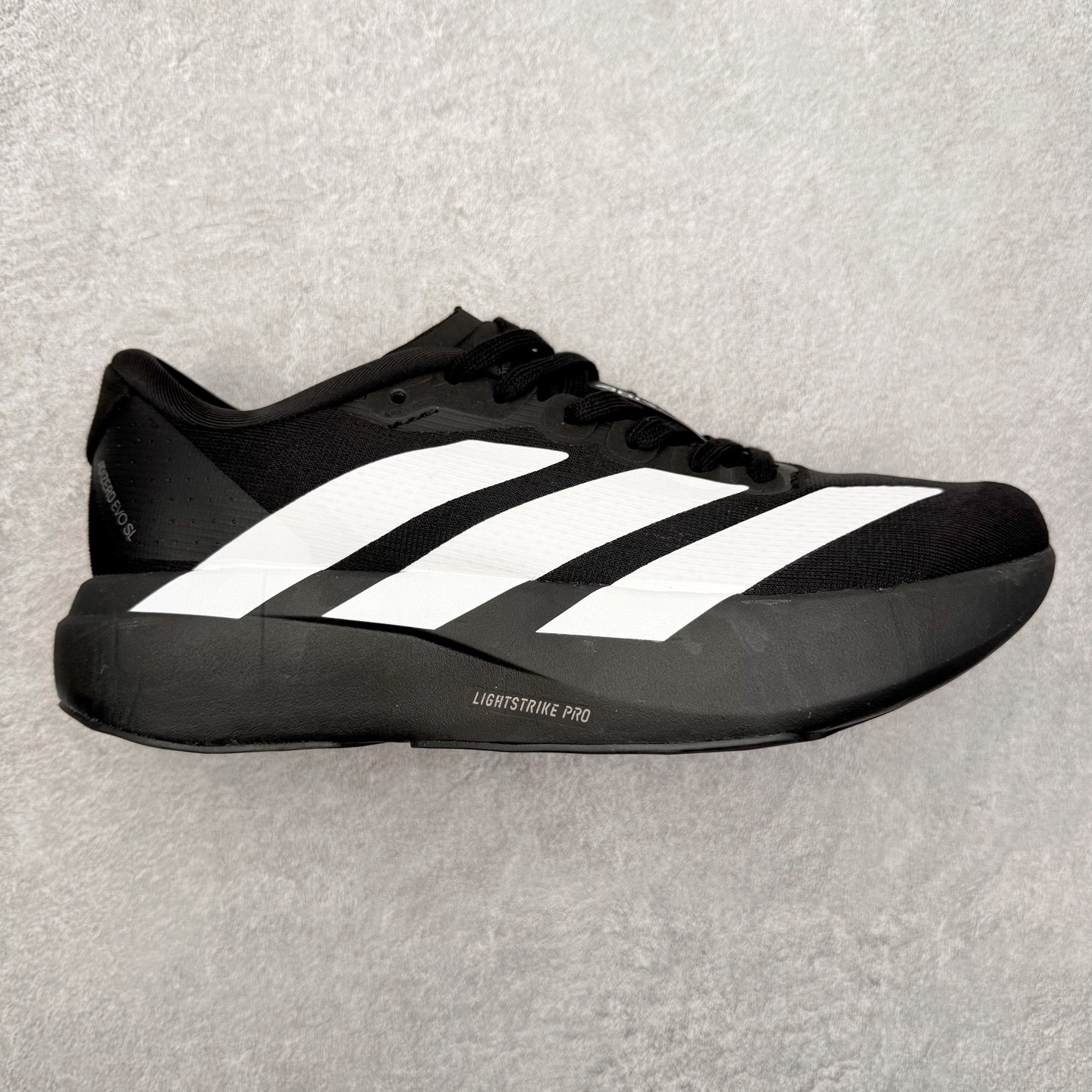 图片[9]-＃福利特价 AD Adizero EVO SL 马拉松竞速专业跑鞋 CELERMESH针织网面非常轻薄 纤维间的缝隙很大 可以保证跑步时的透气、排汗效果 鞋舌直接与两侧的内衬和鞋底连接在一起 在跑步过程中不会被鞋舌的左右移动所困扰 在标准鞋带孔的基础上再拓宽一组鞋带孔 适合不同脚型的需求 突破性 EnergyRods 技术，有助于跑者实现更好的成绩 中底独特的LIGHTSTRIKE PRO泡棉材质 微弹感觉在跑步过程中给予了良好的支撑体验 对于顶级精英和高水平进阶跑者来说 ADIOS PRO是一双值得信赖的竞速比赛用鞋 尺码：36 36.5 37.5 38 38.5 39 40 40.5 41 42 42.5 43 44 44.5 45-选品中心