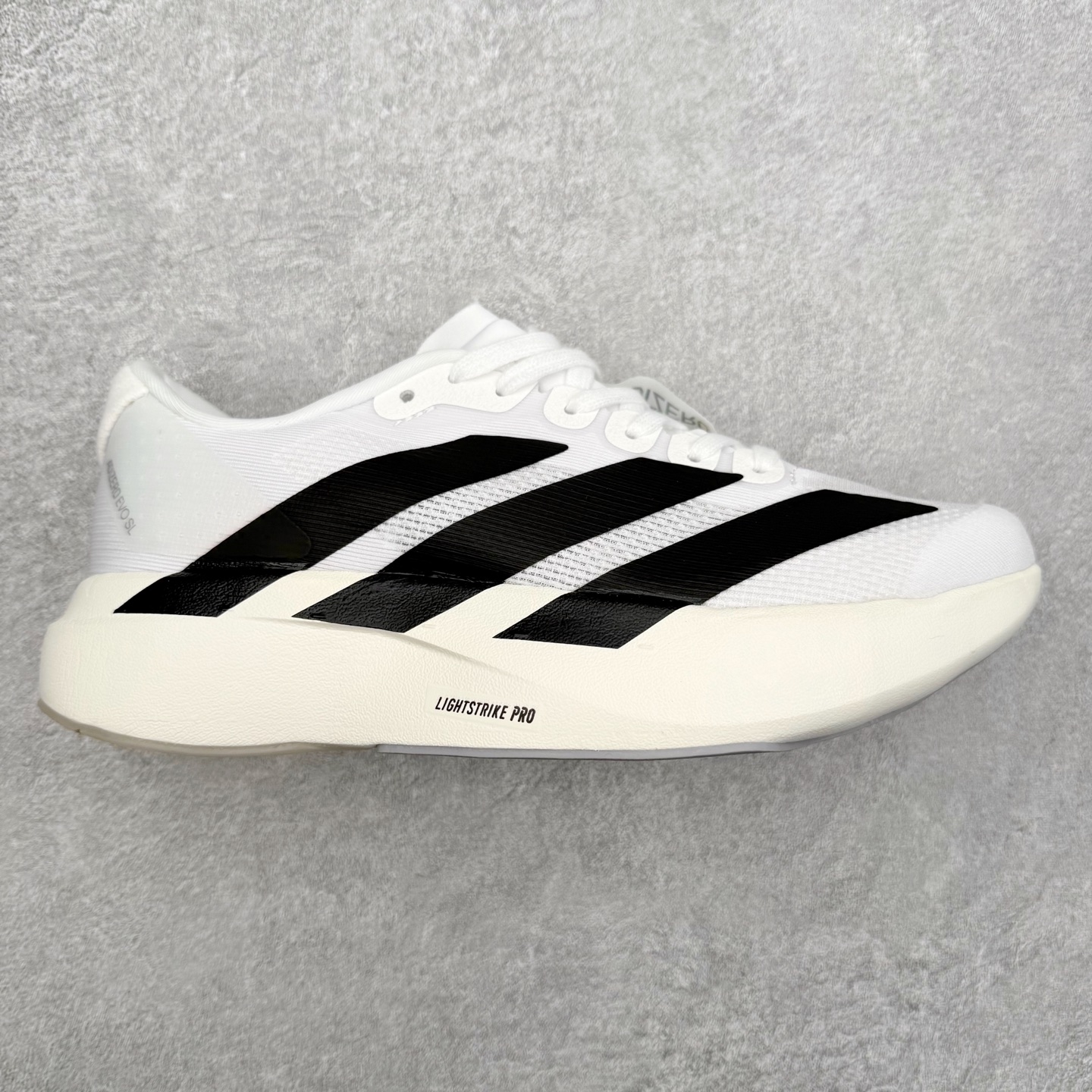 图片[3]-＃福利特价 AD Adizero EVO SL 马拉松竞速专业跑鞋 CELERMESH针织网面非常轻薄 纤维间的缝隙很大 可以保证跑步时的透气、排汗效果 鞋舌直接与两侧的内衬和鞋底连接在一起 在跑步过程中不会被鞋舌的左右移动所困扰 在标准鞋带孔的基础上再拓宽一组鞋带孔 适合不同脚型的需求 突破性 EnergyRods 技术，有助于跑者实现更好的成绩 中底独特的LIGHTSTRIKE PRO泡棉材质 微弹感觉在跑步过程中给予了良好的支撑体验 对于顶级精英和高水平进阶跑者来说 ADIOS PRO是一双值得信赖的竞速比赛用鞋 尺码：36 36.5 37.5 38 38.5 39 40 40.5 41 42 42.5 43 44 44.5 45-选品中心