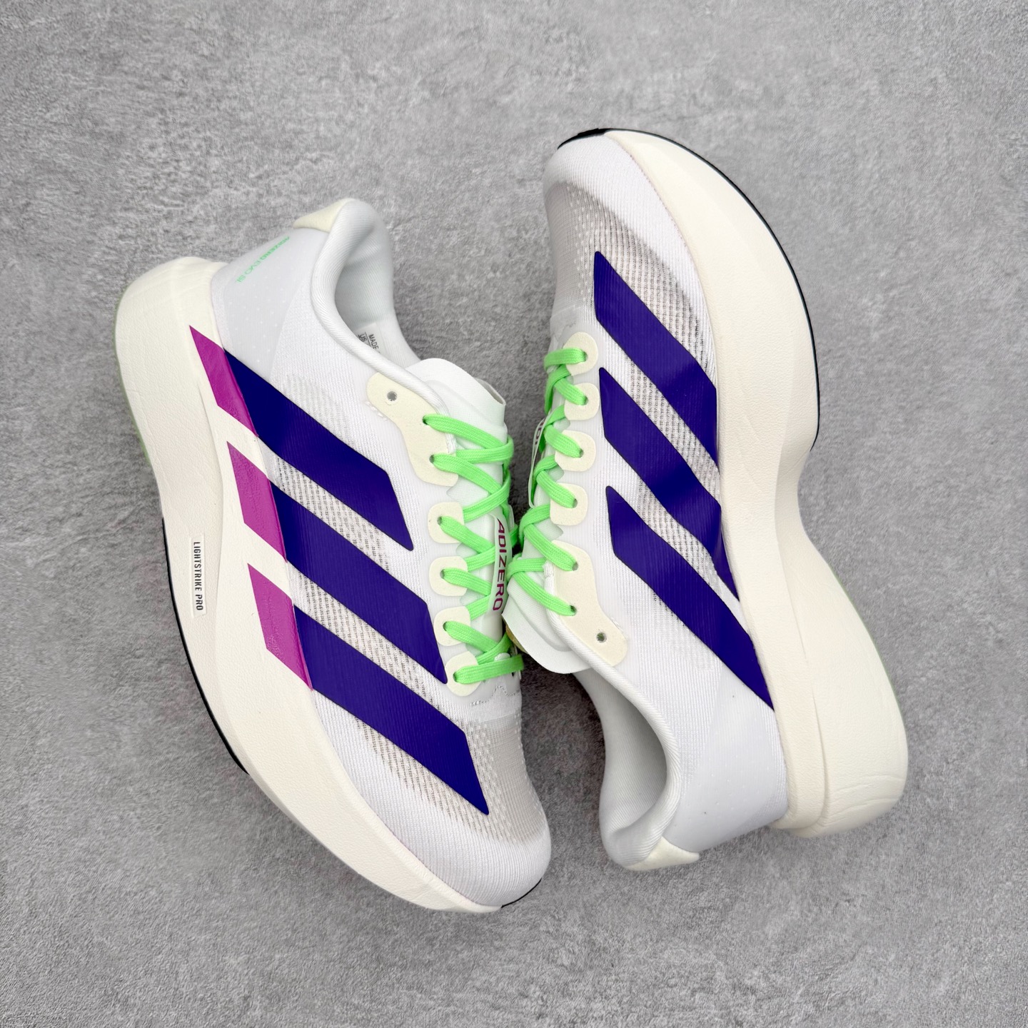 图片[3]-AD Adizero EVO SL 马拉松竞速专业跑鞋 JS4456 CELERMESH针织网面非常轻薄 纤维间的缝隙很大 可以保证跑步时的透气、排汗效果 鞋舌直接与两侧的内衬和鞋底连接在一起 在跑步过程中不会被鞋舌的左右移动所困扰 在标准鞋带孔的基础上再拓宽一组鞋带孔 适合不同脚型的需求 突破性 EnergyRods 技术，有助于跑者实现更好的成绩 中底独特的LIGHTSTRIKE PRO泡棉材质 微弹感觉在跑步过程中给予了良好的支撑体验 对于顶级精英和高水平进阶跑者来说 ADIOS PRO是一双值得信赖的竞速比赛用鞋 尺码：36 36.5 37.5 38 38.5 39 40 40.5 41 42 42.5 43 44 44.5 45-选品中心