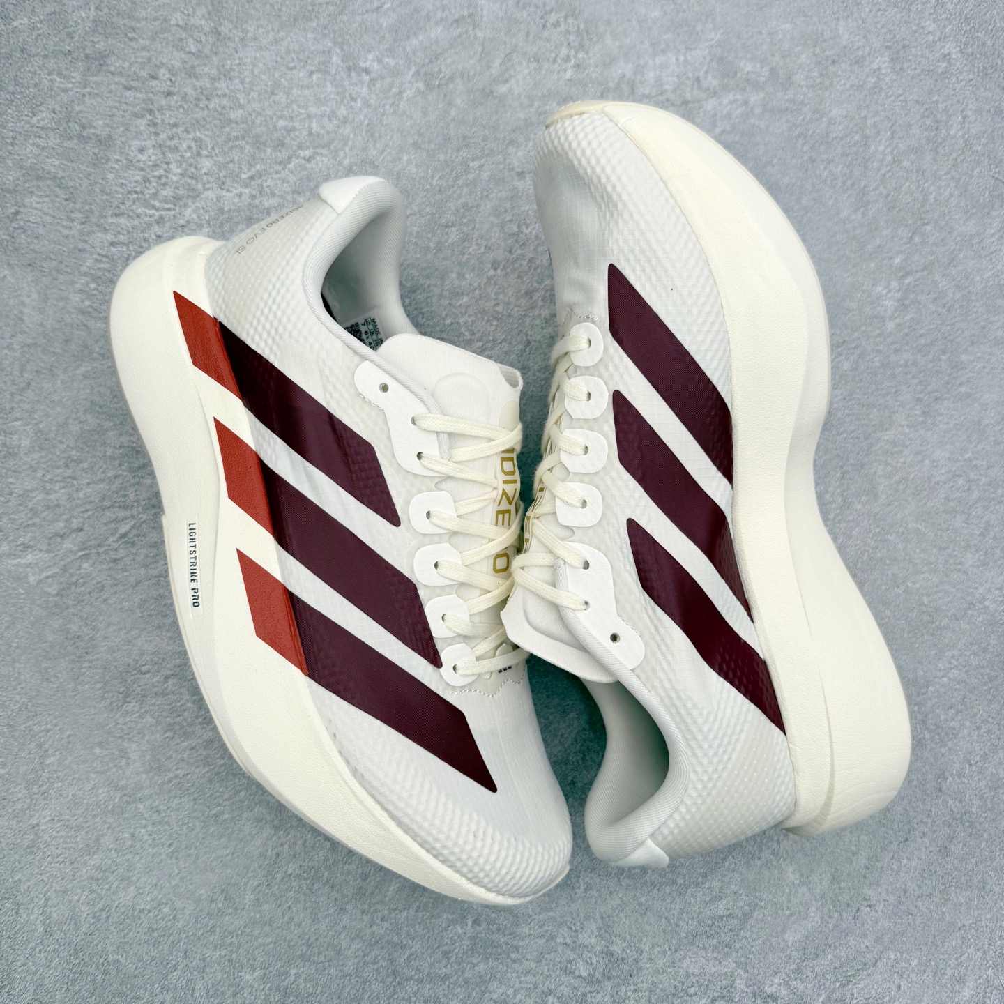 图片[3]-AD Adizero Adios SL 马拉松竞速专业跑鞋 CELERMESH针织网面非常轻薄 纤维间的缝隙很大 可以保证跑步时的透气、排汗效果 鞋舌直接与两侧的内衬和鞋底连接在一起 在跑步过程中不会被鞋舌的左右移动所困扰 在标准鞋带孔的基础上再拓宽一组鞋带孔 适合不同脚型的需求 突破性 EnergyRods 技术，有助于跑者实现更好的成绩 中底独特的LIGHTSTRIKE PRO泡棉材质 微弹感觉在跑步过程中给予了良好的支撑体验 对于顶级精英和高水平进阶跑者来说 ADIOS PRO是一双值得信赖的竞速比赛用鞋 尺码：36 36.5 37.5 38 38.5 39 40 40.5 41 42 42.5 43 44 44.5 45-选品中心