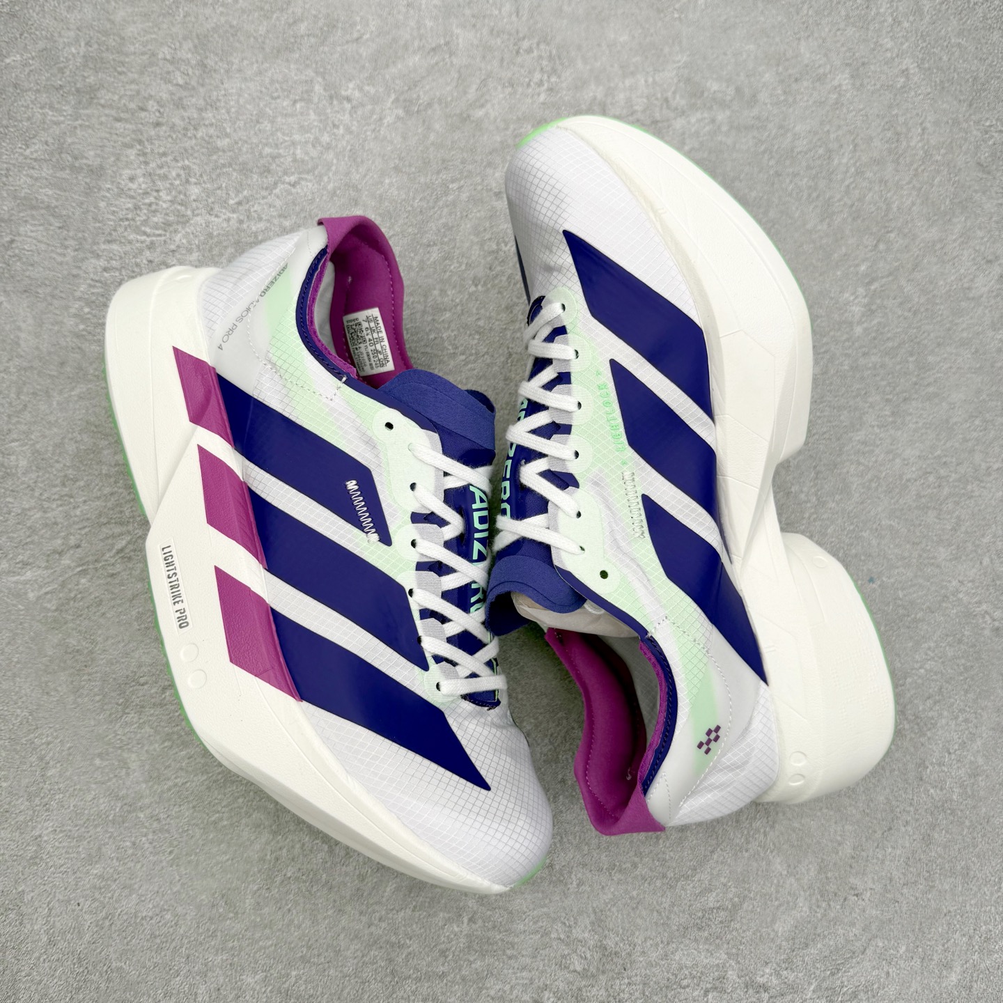 图片[3]-AD Adizero Adios Pro 4 马拉松竞速专业跑鞋 JR1656 CELERMESH针织网面非常轻薄 纤维间的缝隙很大 可以保证跑步时的透气、排汗效果 鞋舌直接与两侧的内衬和鞋底连接在一起 在跑步过程中不会被鞋舌的左右移动所困扰 在标准鞋带孔的基础上再拓宽一组鞋带孔 适合不同脚型的需求 突破性 EnergyRods 技术，有助于跑者实现更好的成绩 中底独特的LIGHTSTRIKE PRO泡棉材质 微弹感觉在跑步过程中给予了良好的支撑体验 对于顶级精英和高水平进阶跑者来说 ADIOS PRO是一双值得信赖的竞速比赛用鞋 尺码：36 36.5 37.5 38 38.5 39 40 40.5 41 42 42.5 43 44 44.5 45-选品中心