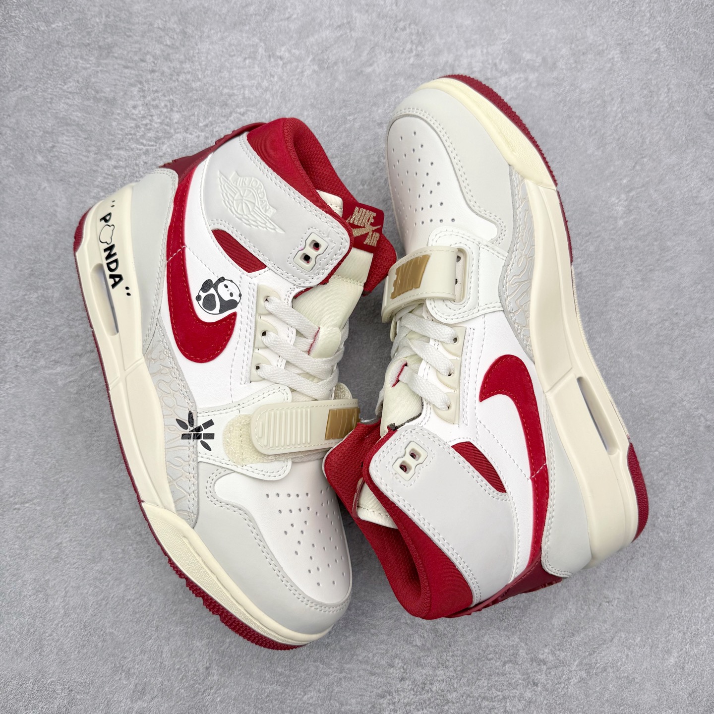 图片[3]-Air Jordan Legacy AJ312 低帮 IQ9785-161 鞋身采用了皮革材质打造 横跨鞋面的魔术贴十分吸睛 侧面的Swoosh Logo的一部分被鞋面遮挡了一部分 颇具玩味 魔术贴上标有NK标识 而鞋舌上是Jordan的经典飞翼Logo 后跟和鞋底均采用了Air Jordan 3 的设计 后跟上同样也使用了经典的爆裂纹图案 尺码：36 36.5 37.5 38 38.5 39 40 40.5 41 42 42.5 43 44 44.5 45 46 47.5-选品中心