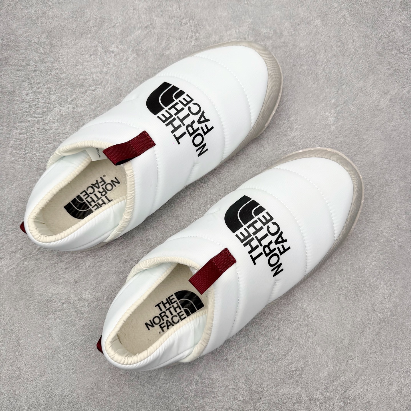 图片[3]-THE NORTH FACE 北面一脚蹬超轻保暖面包棉鞋 专业户外登山品牌（北面）The North Face自1966年创立，由两位热爱登山徒步的年轻登山者于美西旧金山开创，不断透过研发与创新，并且将最先进的技术结合在服装与鞋款设计，生产多种外型帅气且专业能力非常强的户外运动装备而备受欢迎。尺码：36 36.5 37.5 38 38.5 39 40 40.5 41 42 42.5 43 44 44.5 45-选品中心