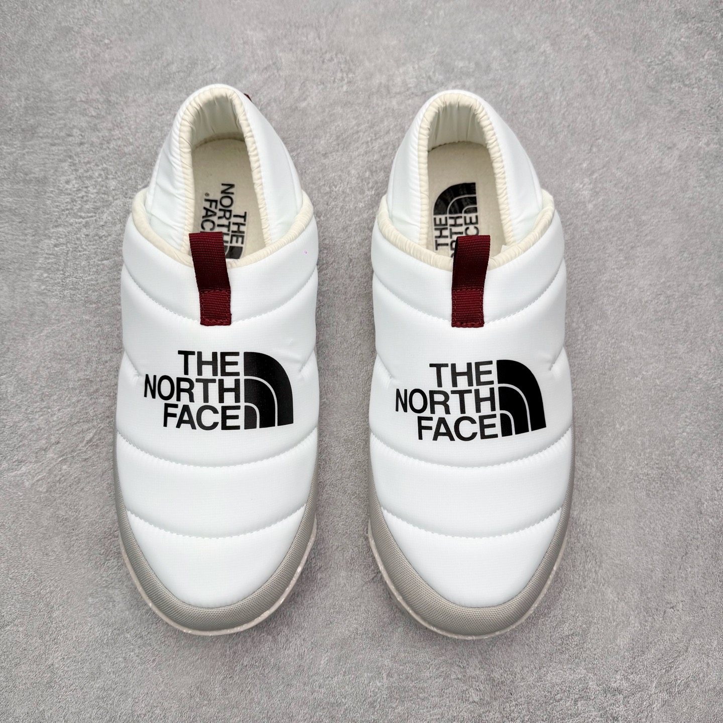 图片[2]-THE NORTH FACE 北面一脚蹬超轻保暖面包棉鞋 专业户外登山品牌（北面）The North Face自1966年创立，由两位热爱登山徒步的年轻登山者于美西旧金山开创，不断透过研发与创新，并且将最先进的技术结合在服装与鞋款设计，生产多种外型帅气且专业能力非常强的户外运动装备而备受欢迎。尺码：36 36.5 37.5 38 38.5 39 40 40.5 41 42 42.5 43 44 44.5 45-选品中心