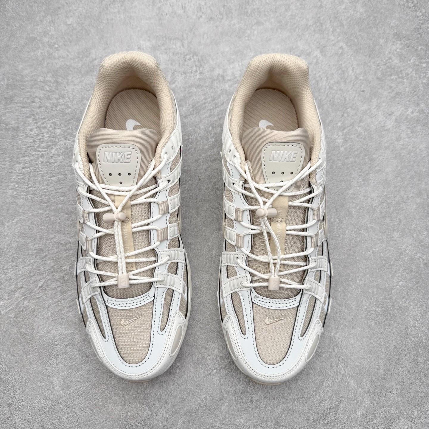 图片[2]-NK P-6000 系列低帮复古老爹风休闲运动舒适慢跑鞋 IM5237-100 融合 Pegasus 过往运动鞋设计 助力 21 世纪早期跑步运动跃升时尚新高度 采用透气网眼布、运动风格线条和耐穿覆面 兼具吸睛外观和舒适感受 中底泡绵以田径赛道为灵感 打造厚实设计 缔造出众缓震性能 尺码：36 36.5 37.5 38 38.5 39 40 40.5 41 42 42.5 43 44 44.5 45-选品中心