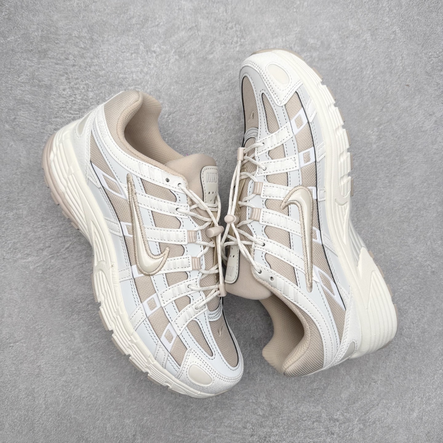 图片[3]-NK P-6000 系列低帮复古老爹风休闲运动舒适慢跑鞋 IM5237-100 融合 Pegasus 过往运动鞋设计 助力 21 世纪早期跑步运动跃升时尚新高度 采用透气网眼布、运动风格线条和耐穿覆面 兼具吸睛外观和舒适感受 中底泡绵以田径赛道为灵感 打造厚实设计 缔造出众缓震性能 尺码：36 36.5 37.5 38 38.5 39 40 40.5 41 42 42.5 43 44 44.5 45-选品中心