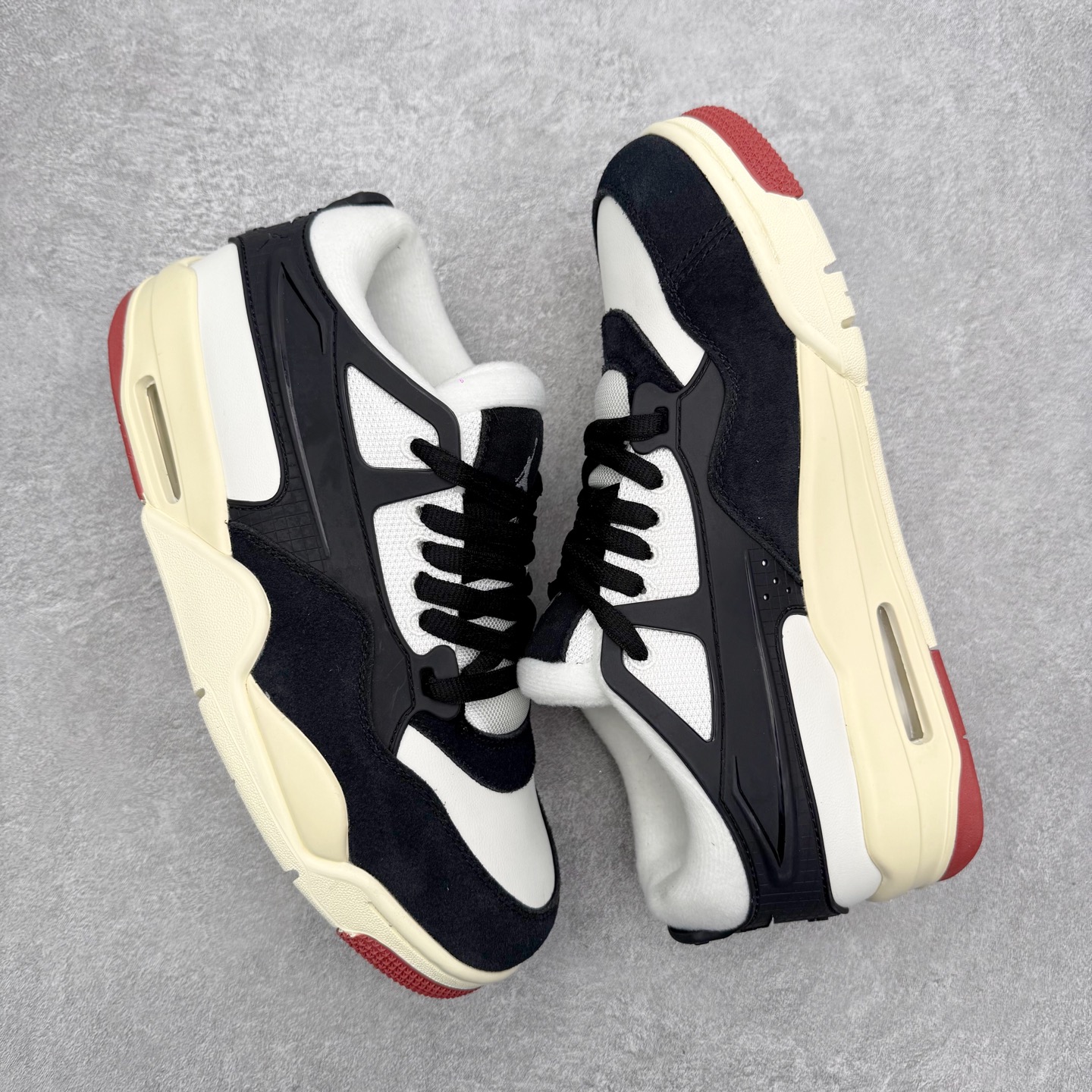 图片[3]-＃KZ纯原 Air Jordan AJ4 RM 重制版低帮复古篮球鞋 FQ7939-100 亲自操刀耗时半年巨作 全套原纸板楦头开发 确保原汁原味 完美呈现版型 一比一鞋头弧度高度鞋身弧度 原厂TPU 正确内里网布 菱角分明不变形无多余毛边 柔软性质感一致于原鞋 原厂织唛标 原厂飞人电绣工艺 尾指中部跳三针 独家绑鞋带手法 印刷中底布 四线拉帮 米色美纹纸贴合固定 进口港宝加持 后跟自然饱满 全鞋荧光划线卡点 追求极致完美 每一双都是工艺品 多重QC质检 超越公司货的品控标准 实实在在的免检产品 采用了低帮的设计 并保留了众多AJ4的经典元素 鞋身以皮革、麂皮材质拼接打造 AJ4经典的TPU材质延伸至后跟 增强鞋款稳定性 而鞋身侧面的网格设计则被取消 尾部的NIKE AIR标志也得到保留 并同时带有飞人logo 中底部分同样搭载了可视AIR气垫 鞋底采用米白色中底和外底呈现 为整个设计收尾 尺码：36 36.5 37.5 38 38.5 39 40 40.5 41 42 42.5 43 44 44.5 45 46 47.5 48.5-选品中心