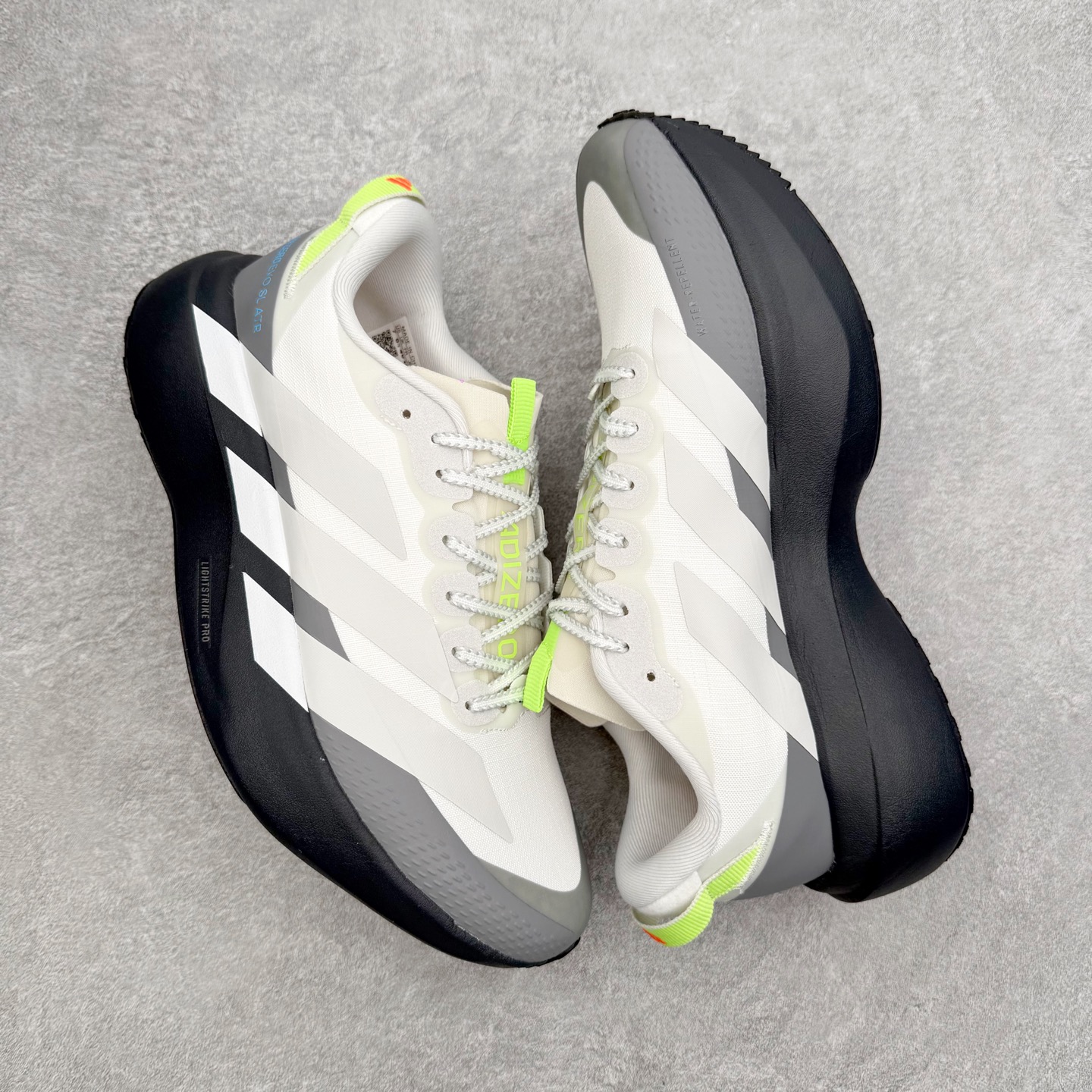 图片[3]-AD Adizero EVO SL ATR M 马拉松竞速专业跑鞋 CELERMESH针织网面非常轻薄 纤维间的缝隙很大 可以保证跑步时的透气、排汗效果 鞋舌直接与两侧的内衬和鞋底连接在一起 在跑步过程中不会被鞋舌的左右移动所困扰 在标准鞋带孔的基础上再拓宽一组鞋带孔 适合不同脚型的需求 突破性 EnergyRods 技术，有助于跑者实现更好的成绩 中底独特的LIGHTSTRIKE PRO泡棉材质 微弹感觉在跑步过程中给予了良好的支撑体验 对于顶级精英和高水平进阶跑者来说 ADIOS PRO是一双值得信赖的竞速比赛用鞋 尺码：36 36.5 37.5 38 38.5 39 40 40.5 41 42 42.5 43 44 44.5 45-选品中心