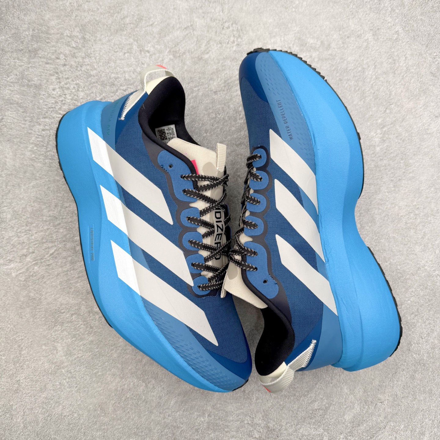 图片[3]-AD Adizero EVO SL ATR M 马拉松竞速专业跑鞋 CELERMESH针织网面非常轻薄 纤维间的缝隙很大 可以保证跑步时的透气、排汗效果 鞋舌直接与两侧的内衬和鞋底连接在一起 在跑步过程中不会被鞋舌的左右移动所困扰 在标准鞋带孔的基础上再拓宽一组鞋带孔 适合不同脚型的需求 突破性 EnergyRods 技术，有助于跑者实现更好的成绩 中底独特的LIGHTSTRIKE PRO泡棉材质 微弹感觉在跑步过程中给予了良好的支撑体验 对于顶级精英和高水平进阶跑者来说 ADIOS PRO是一双值得信赖的竞速比赛用鞋 尺码：36 36.5 37.5 38 38.5 39 40 40.5 41 42 42.5 43 44 44.5 45-选品中心