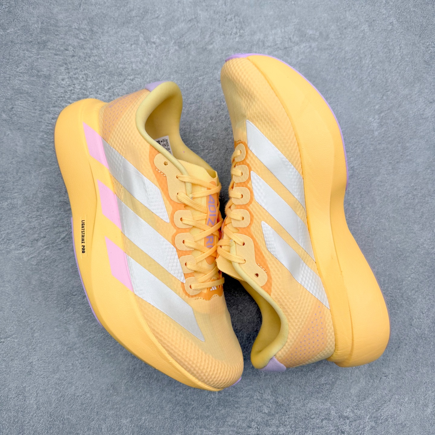 图片[3]-AD Adizero EVO SL 2 马拉松竞速专业跑鞋 CELERMESH针织网面非常轻薄 纤维间的缝隙很大 可以保证跑步时的透气、排汗效果 鞋舌直接与两侧的内衬和鞋底连接在一起 在跑步过程中不会被鞋舌的左右移动所困扰 在标准鞋带孔的基础上再拓宽一组鞋带孔 适合不同脚型的需求 突破性 EnergyRods 技术，有助于跑者实现更好的成绩 中底独特的LIGHTSTRIKE PRO泡棉材质 微弹感觉在跑步过程中给予了良好的支撑体验 对于顶级精英和高水平进阶跑者来说 ADIOS PRO是一双值得信赖的竞速比赛用鞋 尺码：36 36.5 37.5 38 38.5 39 40 40.5 41 42 42.5 43 44 44.5 45-选品中心