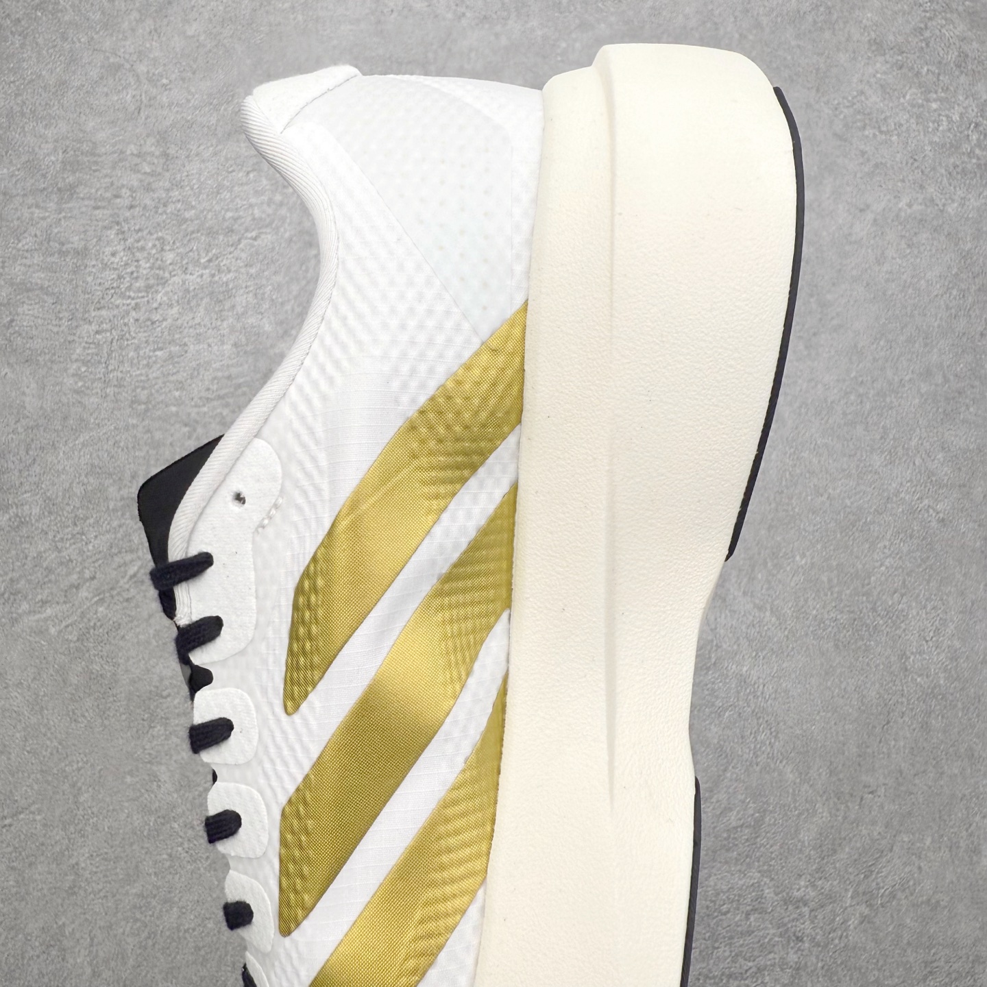 图片[7]-AD Adizero EVO SL 2 马拉松竞速专业跑鞋 CELERMESH针织网面非常轻薄 纤维间的缝隙很大 可以保证跑步时的透气、排汗效果 鞋舌直接与两侧的内衬和鞋底连接在一起 在跑步过程中不会被鞋舌的左右移动所困扰 在标准鞋带孔的基础上再拓宽一组鞋带孔 适合不同脚型的需求 突破性 EnergyRods 技术，有助于跑者实现更好的成绩 中底独特的LIGHTSTRIKE PRO泡棉材质 微弹感觉在跑步过程中给予了良好的支撑体验 对于顶级精英和高水平进阶跑者来说 ADIOS PRO是一双值得信赖的竞速比赛用鞋 尺码：36 36.5 37.5 38 38.5 39 40 40.5 41 42 42.5 43 44 44.5 45-选品中心