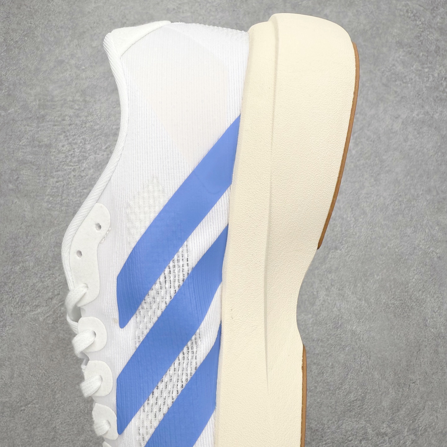 图片[7]-＃福利特价 AD Adizero EVO SL 马拉松竞速专业跑鞋 CELERMESH针织网面非常轻薄 纤维间的缝隙很大 可以保证跑步时的透气、排汗效果 鞋舌直接与两侧的内衬和鞋底连接在一起 在跑步过程中不会被鞋舌的左右移动所困扰 在标准鞋带孔的基础上再拓宽一组鞋带孔 适合不同脚型的需求 突破性 EnergyRods 技术，有助于跑者实现更好的成绩 中底独特的LIGHTSTRIKE PRO泡棉材质 微弹感觉在跑步过程中给予了良好的支撑体验 对于顶级精英和高水平进阶跑者来说 ADIOS PRO是一双值得信赖的竞速比赛用鞋 尺码：36 36.5 37.5 38 38.5 39 40 40.5 41 42 42.5 43 44 44.5 45-选品中心