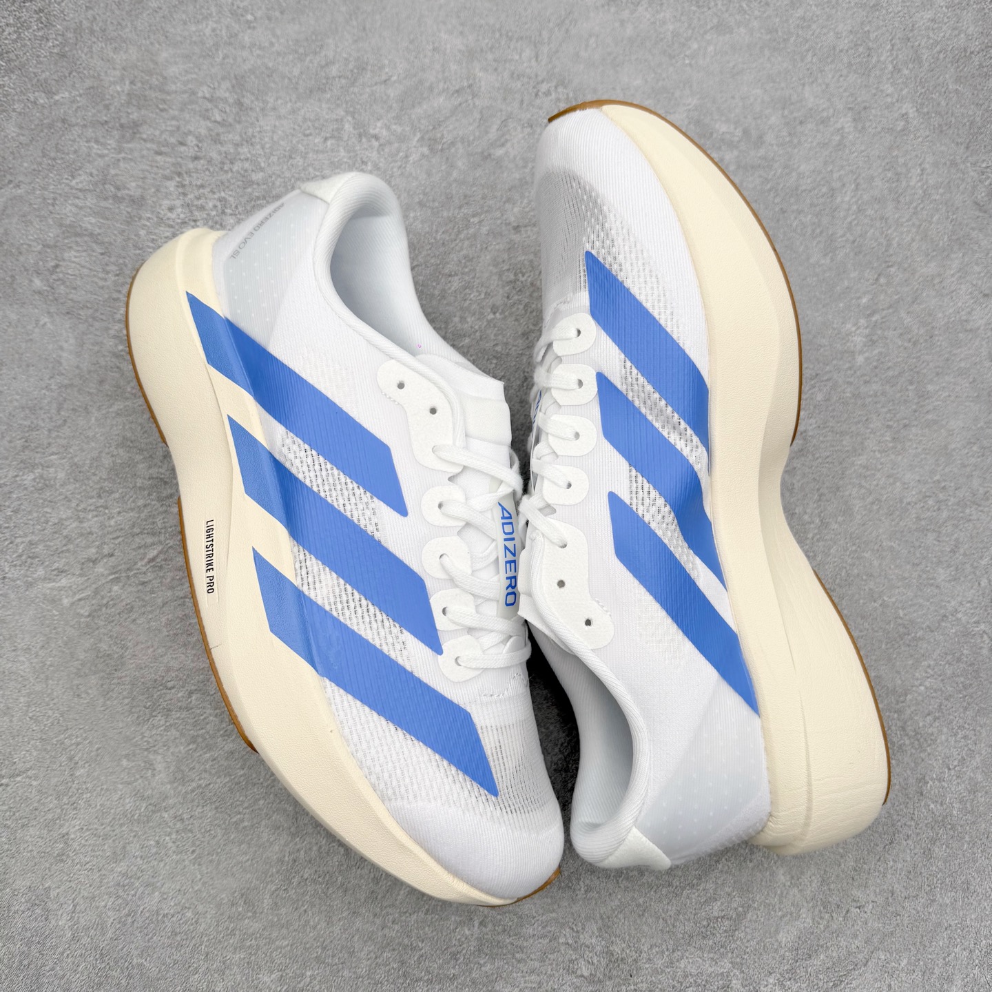 图片[3]-＃福利特价 AD Adizero EVO SL 马拉松竞速专业跑鞋 CELERMESH针织网面非常轻薄 纤维间的缝隙很大 可以保证跑步时的透气、排汗效果 鞋舌直接与两侧的内衬和鞋底连接在一起 在跑步过程中不会被鞋舌的左右移动所困扰 在标准鞋带孔的基础上再拓宽一组鞋带孔 适合不同脚型的需求 突破性 EnergyRods 技术，有助于跑者实现更好的成绩 中底独特的LIGHTSTRIKE PRO泡棉材质 微弹感觉在跑步过程中给予了良好的支撑体验 对于顶级精英和高水平进阶跑者来说 ADIOS PRO是一双值得信赖的竞速比赛用鞋 尺码：36 36.5 37.5 38 38.5 39 40 40.5 41 42 42.5 43 44 44.5 45-选品中心