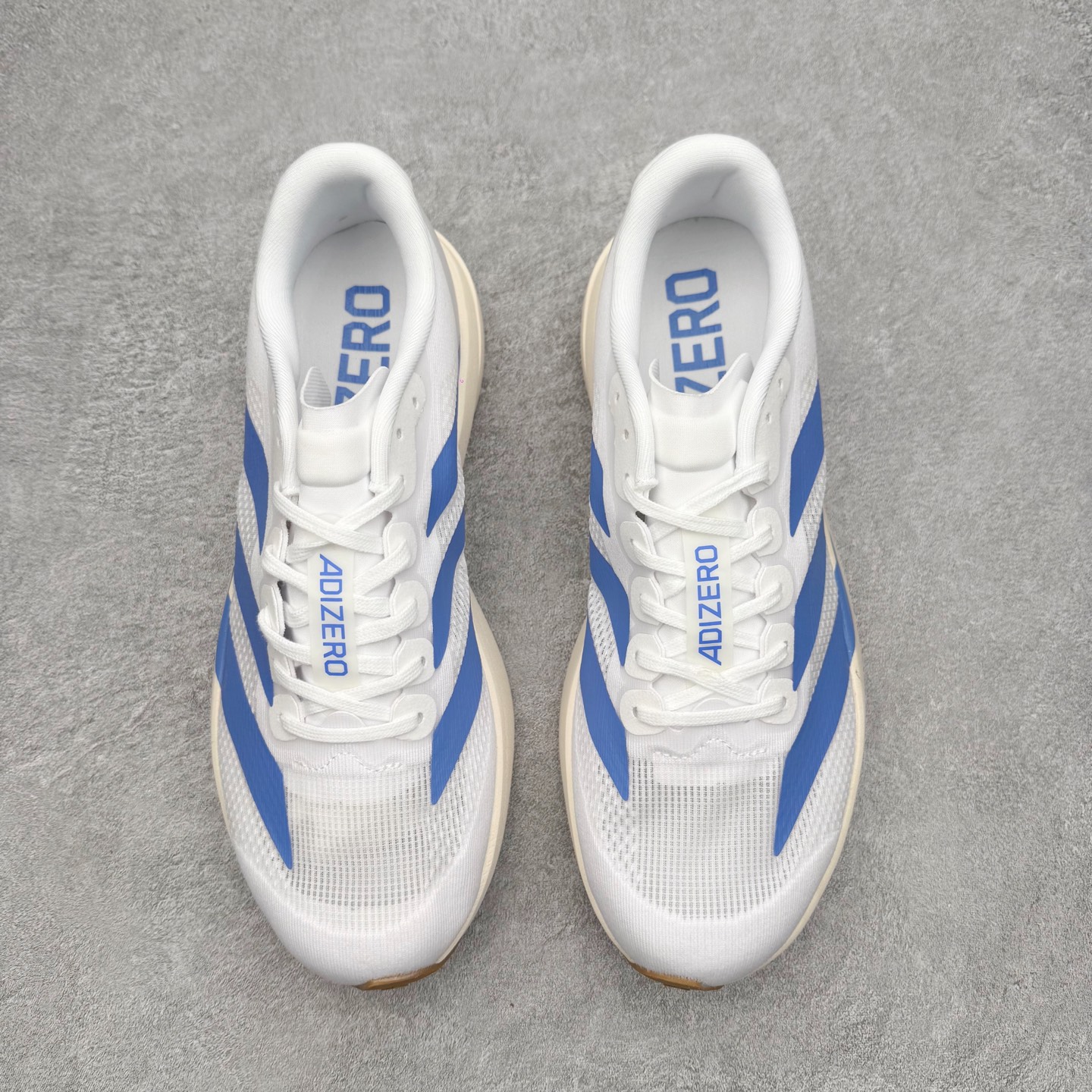 图片[2]-＃福利特价 AD Adizero EVO SL 马拉松竞速专业跑鞋 CELERMESH针织网面非常轻薄 纤维间的缝隙很大 可以保证跑步时的透气、排汗效果 鞋舌直接与两侧的内衬和鞋底连接在一起 在跑步过程中不会被鞋舌的左右移动所困扰 在标准鞋带孔的基础上再拓宽一组鞋带孔 适合不同脚型的需求 突破性 EnergyRods 技术，有助于跑者实现更好的成绩 中底独特的LIGHTSTRIKE PRO泡棉材质 微弹感觉在跑步过程中给予了良好的支撑体验 对于顶级精英和高水平进阶跑者来说 ADIOS PRO是一双值得信赖的竞速比赛用鞋 尺码：36 36.5 37.5 38 38.5 39 40 40.5 41 42 42.5 43 44 44.5 45-选品中心