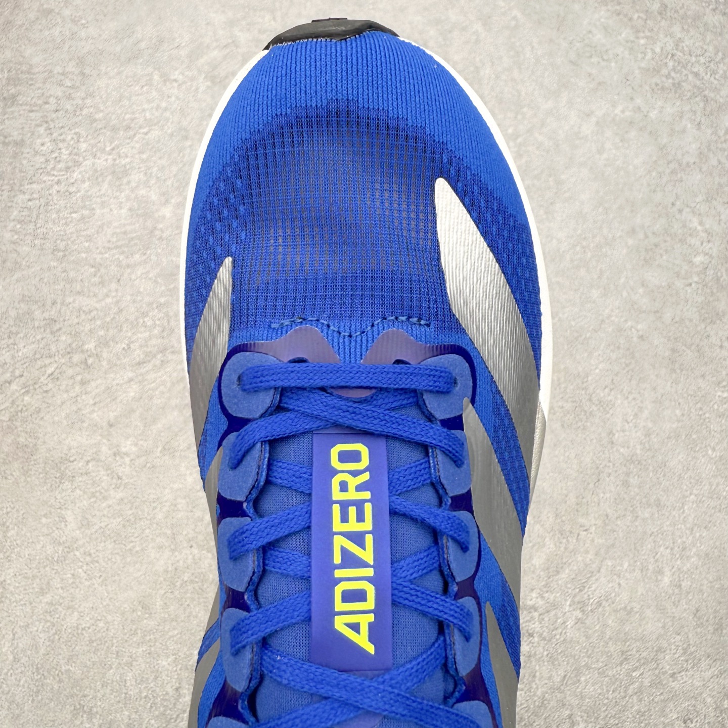 图片[4]-＃福利特价 AD Adizero EVO SL 马拉松竞速专业跑鞋 CELERMESH针织网面非常轻薄 纤维间的缝隙很大 可以保证跑步时的透气、排汗效果 鞋舌直接与两侧的内衬和鞋底连接在一起 在跑步过程中不会被鞋舌的左右移动所困扰 在标准鞋带孔的基础上再拓宽一组鞋带孔 适合不同脚型的需求 突破性 EnergyRods 技术，有助于跑者实现更好的成绩 中底独特的LIGHTSTRIKE PRO泡棉材质 微弹感觉在跑步过程中给予了良好的支撑体验 对于顶级精英和高水平进阶跑者来说 ADIOS PRO是一双值得信赖的竞速比赛用鞋 尺码：36 36.5 37.5 38 38.5 39 40 40.5 41 42 42.5 43 44 44.5 45-选品中心