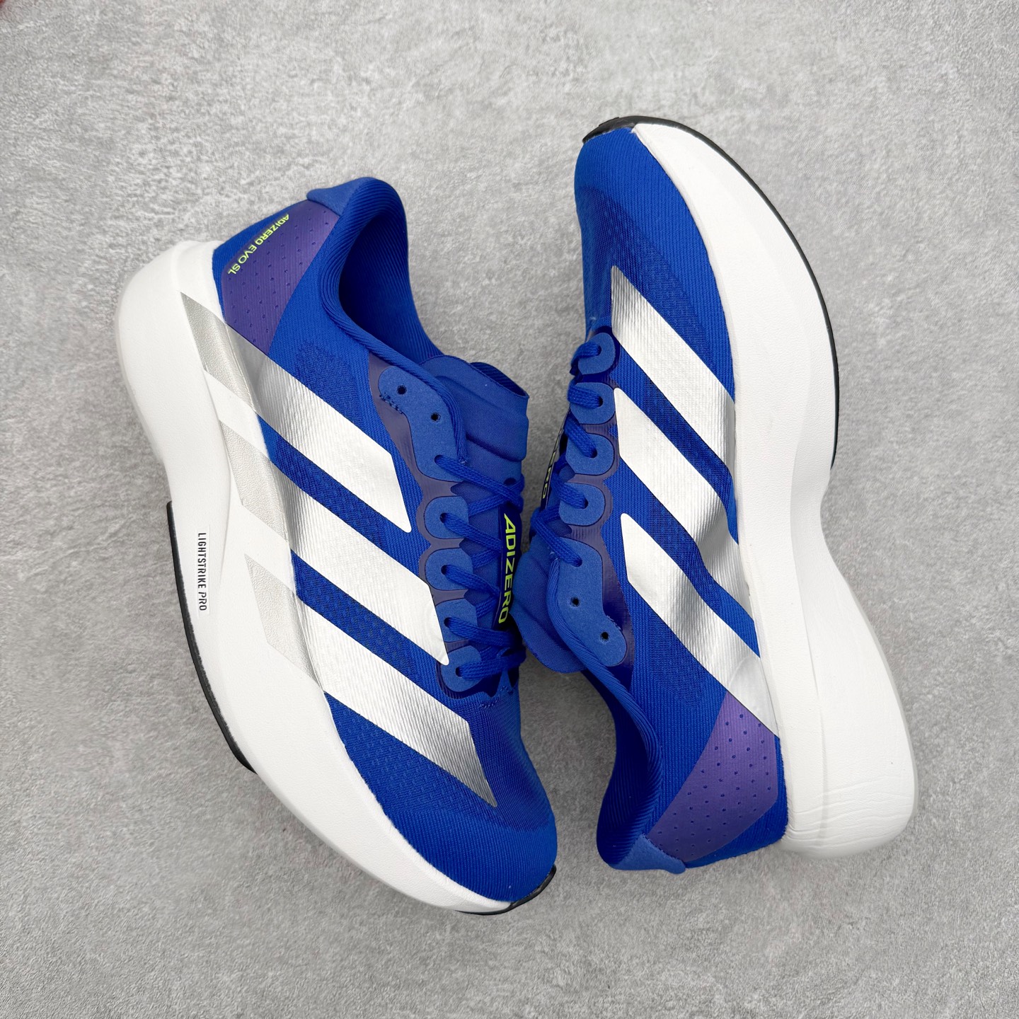 图片[3]-＃福利特价 AD Adizero EVO SL 马拉松竞速专业跑鞋 CELERMESH针织网面非常轻薄 纤维间的缝隙很大 可以保证跑步时的透气、排汗效果 鞋舌直接与两侧的内衬和鞋底连接在一起 在跑步过程中不会被鞋舌的左右移动所困扰 在标准鞋带孔的基础上再拓宽一组鞋带孔 适合不同脚型的需求 突破性 EnergyRods 技术，有助于跑者实现更好的成绩 中底独特的LIGHTSTRIKE PRO泡棉材质 微弹感觉在跑步过程中给予了良好的支撑体验 对于顶级精英和高水平进阶跑者来说 ADIOS PRO是一双值得信赖的竞速比赛用鞋 尺码：36 36.5 37.5 38 38.5 39 40 40.5 41 42 42.5 43 44 44.5 45-选品中心