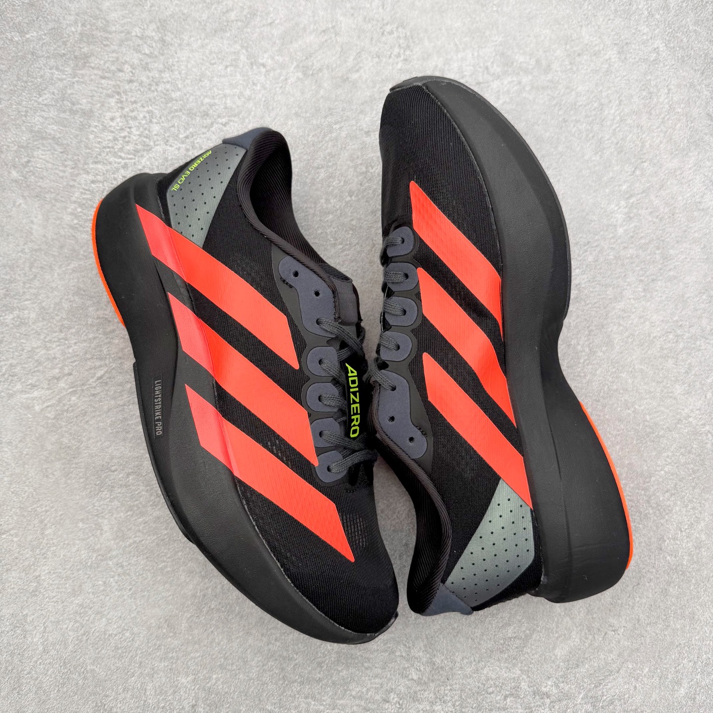 图片[3]-＃福利特价 AD Adizero EVO SL 马拉松竞速专业跑鞋 CELERMESH针织网面非常轻薄 纤维间的缝隙很大 可以保证跑步时的透气、排汗效果 鞋舌直接与两侧的内衬和鞋底连接在一起 在跑步过程中不会被鞋舌的左右移动所困扰 在标准鞋带孔的基础上再拓宽一组鞋带孔 适合不同脚型的需求 突破性 EnergyRods 技术，有助于跑者实现更好的成绩 中底独特的LIGHTSTRIKE PRO泡棉材质 微弹感觉在跑步过程中给予了良好的支撑体验 对于顶级精英和高水平进阶跑者来说 ADIOS PRO是一双值得信赖的竞速比赛用鞋 尺码：36 36.5 37.5 38 38.5 39 40 40.5 41 42 42.5 43 44 44.5 45-选品中心