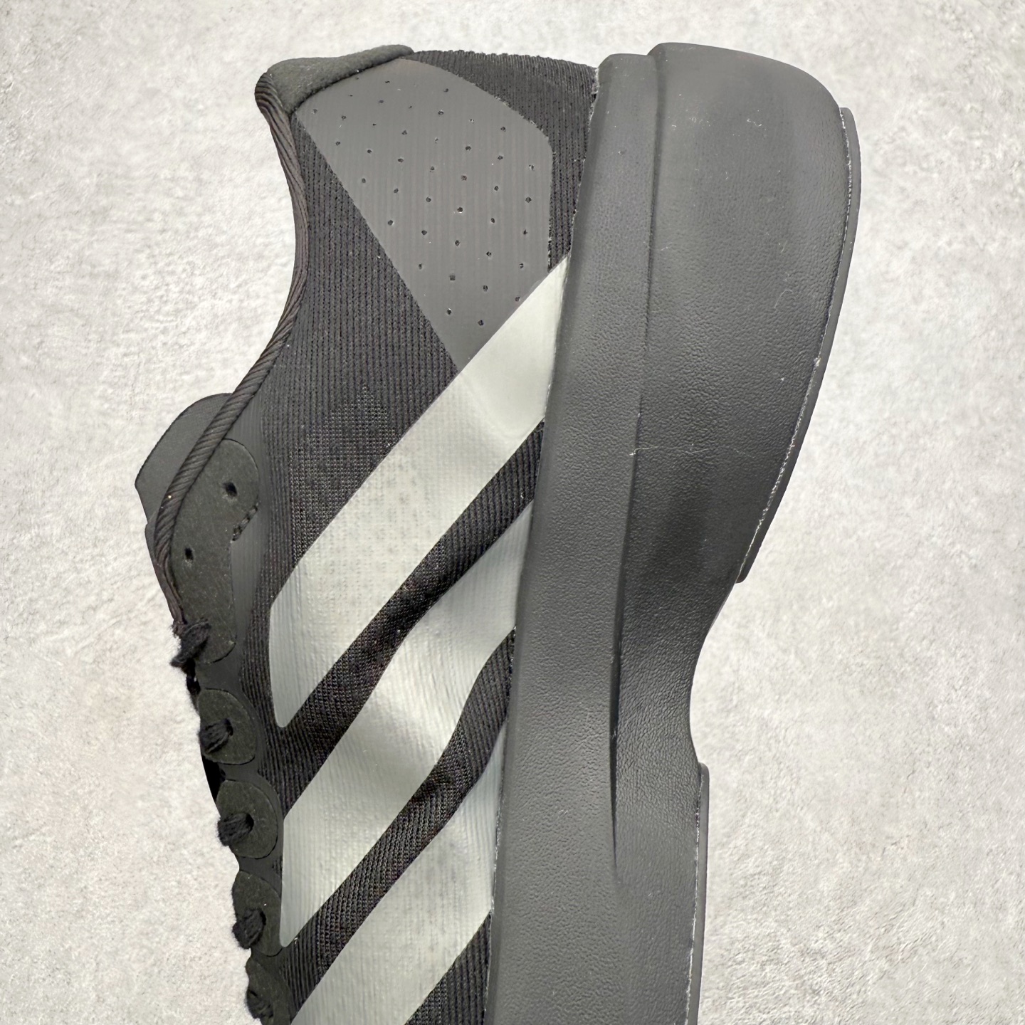 图片[7]-＃福利特价 AD Adizero EVO SL 马拉松竞速专业跑鞋 CELERMESH针织网面非常轻薄 纤维间的缝隙很大 可以保证跑步时的透气、排汗效果 鞋舌直接与两侧的内衬和鞋底连接在一起 在跑步过程中不会被鞋舌的左右移动所困扰 在标准鞋带孔的基础上再拓宽一组鞋带孔 适合不同脚型的需求 突破性 EnergyRods 技术，有助于跑者实现更好的成绩 中底独特的LIGHTSTRIKE PRO泡棉材质 微弹感觉在跑步过程中给予了良好的支撑体验 对于顶级精英和高水平进阶跑者来说 ADIOS PRO是一双值得信赖的竞速比赛用鞋 尺码：36 36.5 37.5 38 38.5 39 40 40.5 41 42 42.5 43 44 44.5 45-选品中心