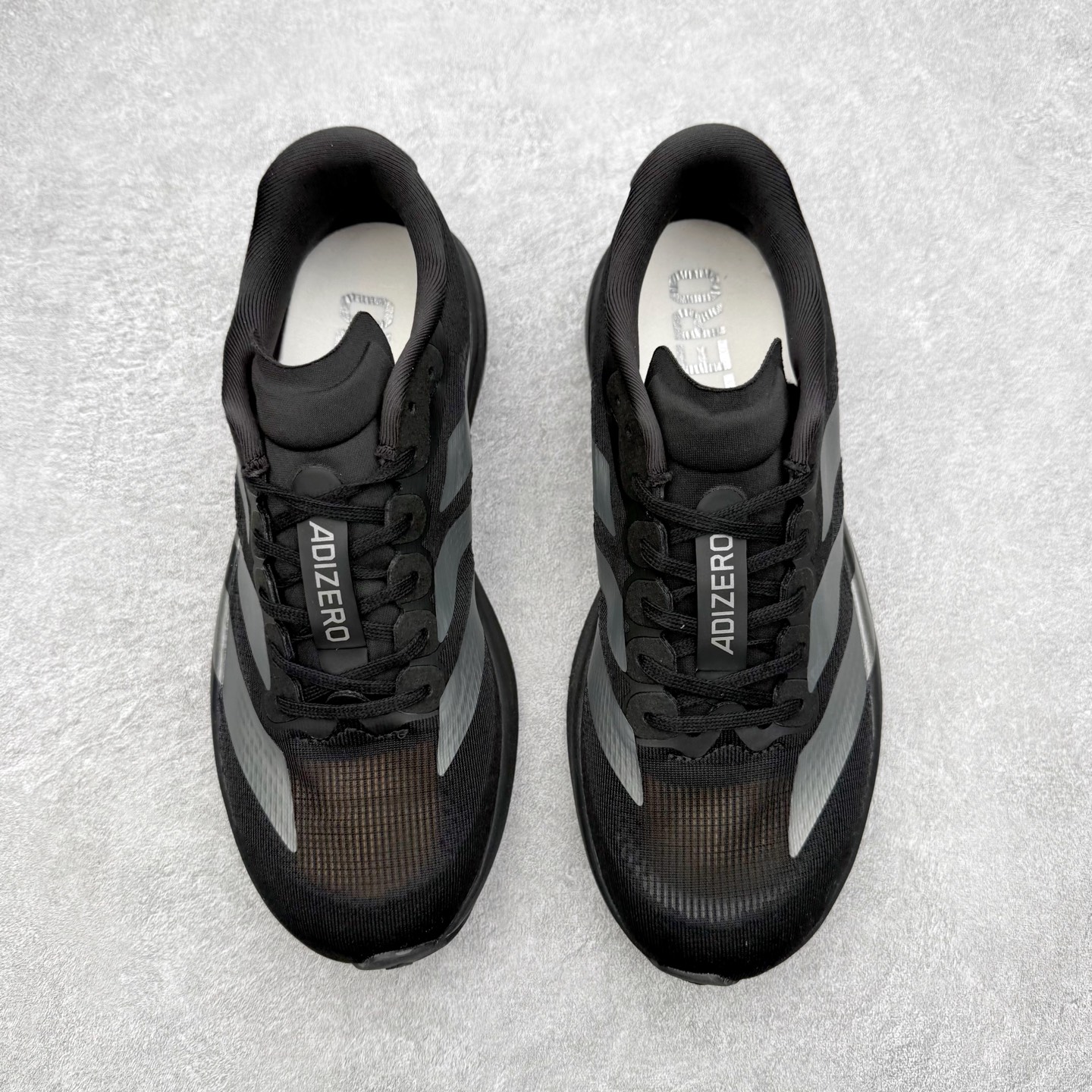 图片[2]-＃福利特价 AD Adizero EVO SL 马拉松竞速专业跑鞋 CELERMESH针织网面非常轻薄 纤维间的缝隙很大 可以保证跑步时的透气、排汗效果 鞋舌直接与两侧的内衬和鞋底连接在一起 在跑步过程中不会被鞋舌的左右移动所困扰 在标准鞋带孔的基础上再拓宽一组鞋带孔 适合不同脚型的需求 突破性 EnergyRods 技术，有助于跑者实现更好的成绩 中底独特的LIGHTSTRIKE PRO泡棉材质 微弹感觉在跑步过程中给予了良好的支撑体验 对于顶级精英和高水平进阶跑者来说 ADIOS PRO是一双值得信赖的竞速比赛用鞋 尺码：36 36.5 37.5 38 38.5 39 40 40.5 41 42 42.5 43 44 44.5 45-选品中心