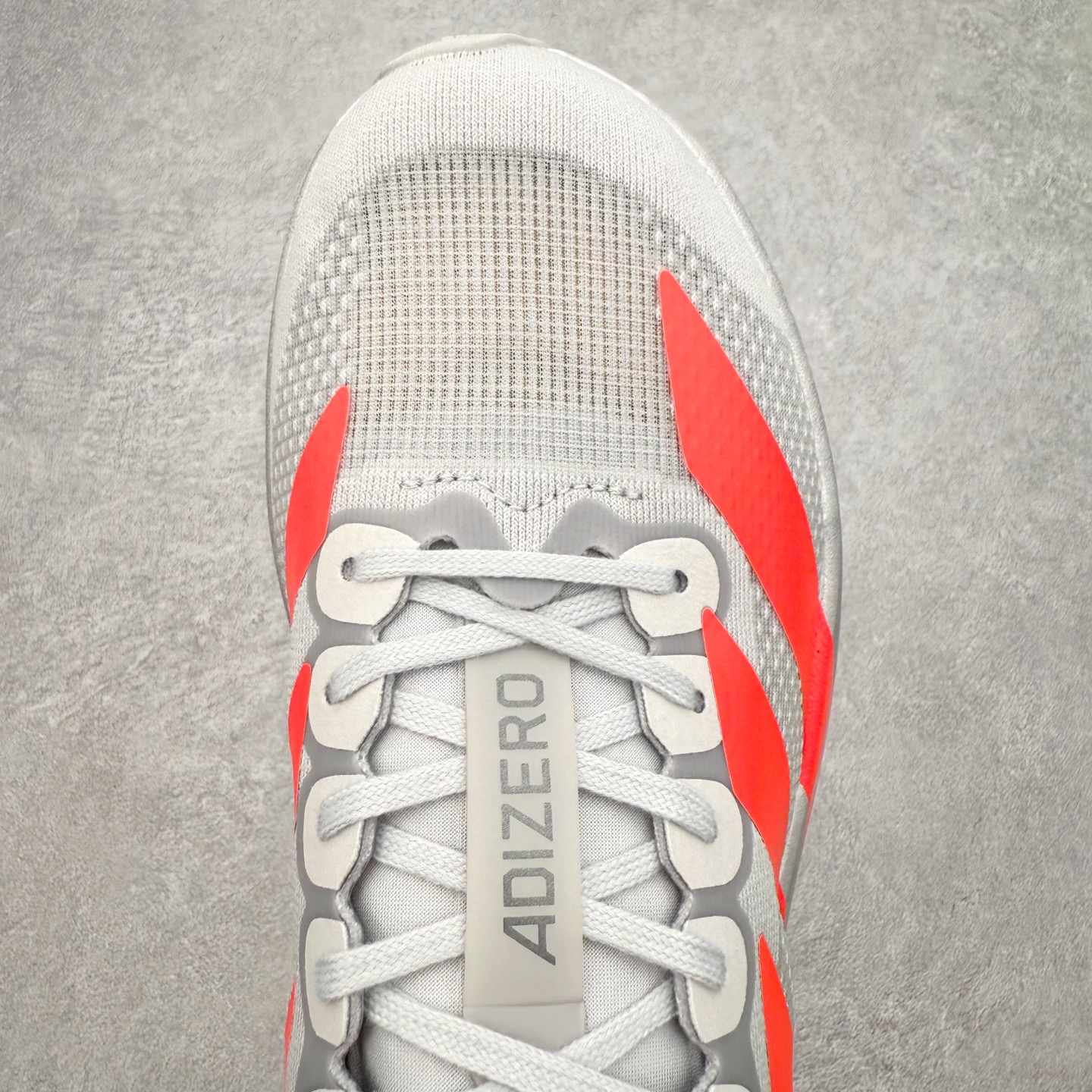 图片[4]-＃福利特价 AD Adizero EVO SL 马拉松竞速专业跑鞋 CELERMESH针织网面非常轻薄 纤维间的缝隙很大 可以保证跑步时的透气、排汗效果 鞋舌直接与两侧的内衬和鞋底连接在一起 在跑步过程中不会被鞋舌的左右移动所困扰 在标准鞋带孔的基础上再拓宽一组鞋带孔 适合不同脚型的需求 突破性 EnergyRods 技术，有助于跑者实现更好的成绩 中底独特的LIGHTSTRIKE PRO泡棉材质 微弹感觉在跑步过程中给予了良好的支撑体验 对于顶级精英和高水平进阶跑者来说 ADIOS PRO是一双值得信赖的竞速比赛用鞋 尺码：36 36.5 37.5 38 38.5 39 40 40.5 41 42 42.5 43 44 44.5 45-选品中心