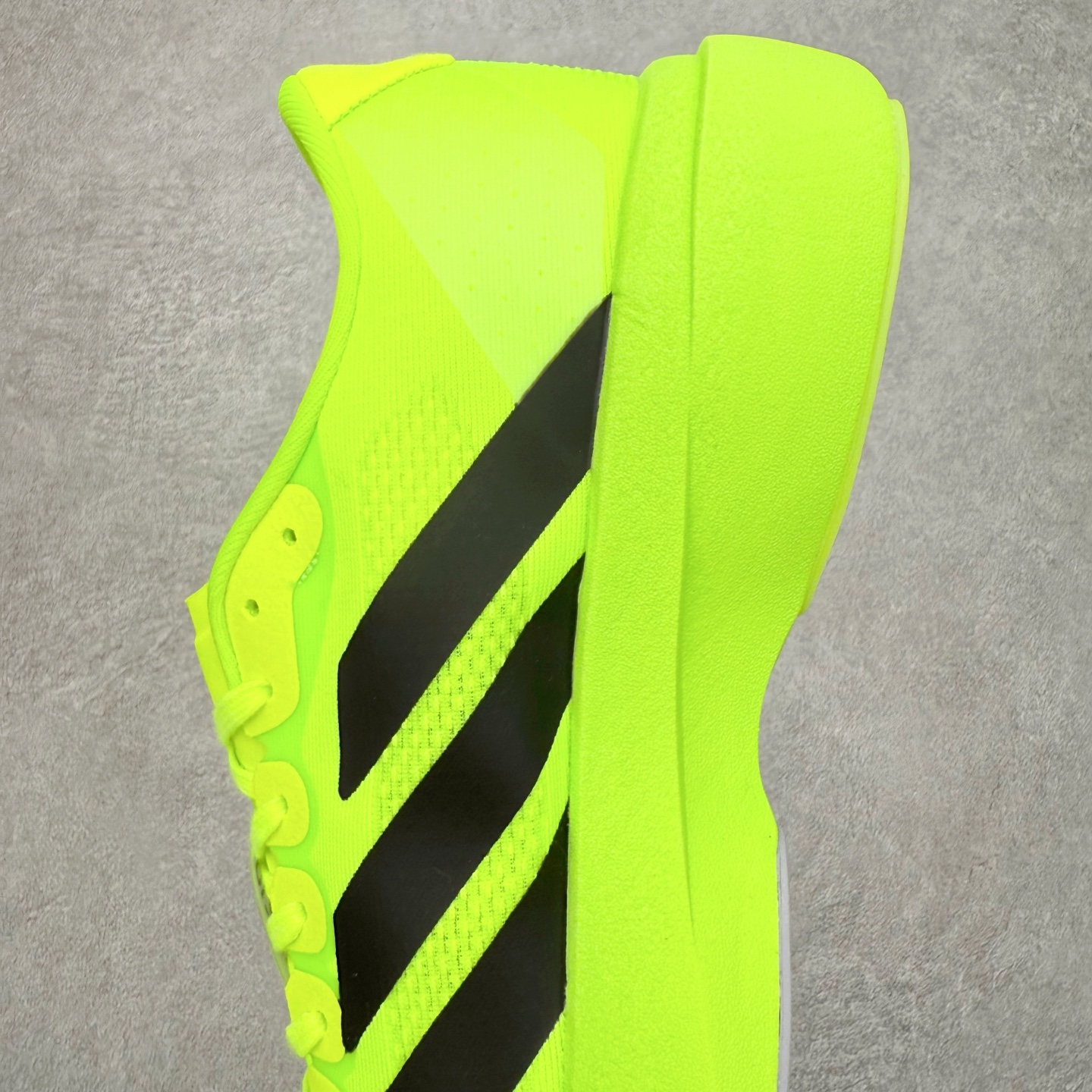 图片[7]-＃福利特价 AD Adizero EVO SL 马拉松竞速专业跑鞋 CELERMESH针织网面非常轻薄 纤维间的缝隙很大 可以保证跑步时的透气、排汗效果 鞋舌直接与两侧的内衬和鞋底连接在一起 在跑步过程中不会被鞋舌的左右移动所困扰 在标准鞋带孔的基础上再拓宽一组鞋带孔 适合不同脚型的需求 突破性 EnergyRods 技术，有助于跑者实现更好的成绩 中底独特的LIGHTSTRIKE PRO泡棉材质 微弹感觉在跑步过程中给予了良好的支撑体验 对于顶级精英和高水平进阶跑者来说 ADIOS PRO是一双值得信赖的竞速比赛用鞋 尺码：36 36.5 37.5 38 38.5 39 40 40.5 41 42 42.5 43 44 44.5 45-选品中心