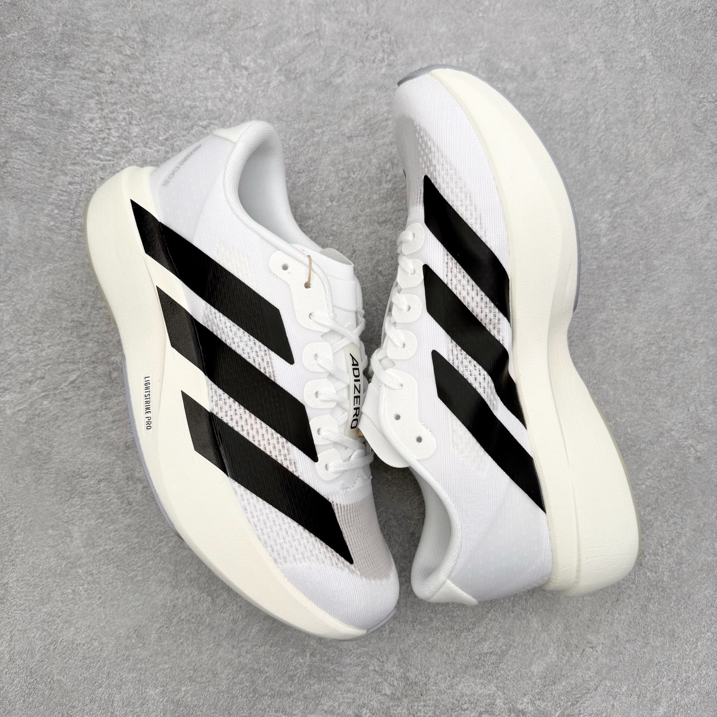 图片[3]-＃福利特价 AD Adizero EVO SL 马拉松竞速专业跑鞋 CELERMESH针织网面非常轻薄 纤维间的缝隙很大 可以保证跑步时的透气、排汗效果 鞋舌直接与两侧的内衬和鞋底连接在一起 在跑步过程中不会被鞋舌的左右移动所困扰 在标准鞋带孔的基础上再拓宽一组鞋带孔 适合不同脚型的需求 突破性 EnergyRods 技术，有助于跑者实现更好的成绩 中底独特的LIGHTSTRIKE PRO泡棉材质 微弹感觉在跑步过程中给予了良好的支撑体验 对于顶级精英和高水平进阶跑者来说 ADIOS PRO是一双值得信赖的竞速比赛用鞋 尺码：36 36.5 37.5 38 38.5 39 40 40.5 41 42 42.5 43 44 44.5 45-选品中心