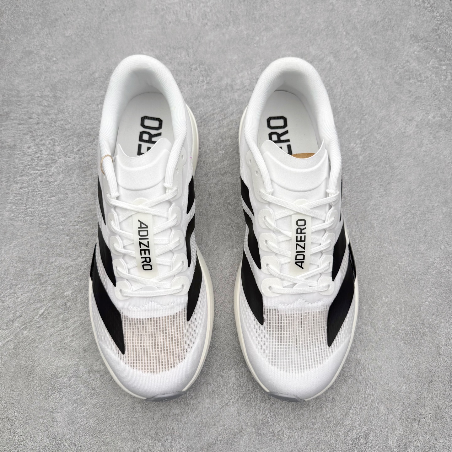 图片[2]-＃福利特价 AD Adizero EVO SL 马拉松竞速专业跑鞋 CELERMESH针织网面非常轻薄 纤维间的缝隙很大 可以保证跑步时的透气、排汗效果 鞋舌直接与两侧的内衬和鞋底连接在一起 在跑步过程中不会被鞋舌的左右移动所困扰 在标准鞋带孔的基础上再拓宽一组鞋带孔 适合不同脚型的需求 突破性 EnergyRods 技术，有助于跑者实现更好的成绩 中底独特的LIGHTSTRIKE PRO泡棉材质 微弹感觉在跑步过程中给予了良好的支撑体验 对于顶级精英和高水平进阶跑者来说 ADIOS PRO是一双值得信赖的竞速比赛用鞋 尺码：36 36.5 37.5 38 38.5 39 40 40.5 41 42 42.5 43 44 44.5 45-选品中心