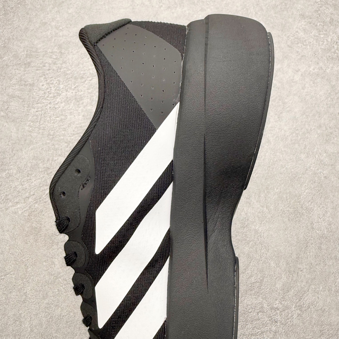 图片[7]-＃福利特价 AD Adizero EVO SL 马拉松竞速专业跑鞋 CELERMESH针织网面非常轻薄 纤维间的缝隙很大 可以保证跑步时的透气、排汗效果 鞋舌直接与两侧的内衬和鞋底连接在一起 在跑步过程中不会被鞋舌的左右移动所困扰 在标准鞋带孔的基础上再拓宽一组鞋带孔 适合不同脚型的需求 突破性 EnergyRods 技术，有助于跑者实现更好的成绩 中底独特的LIGHTSTRIKE PRO泡棉材质 微弹感觉在跑步过程中给予了良好的支撑体验 对于顶级精英和高水平进阶跑者来说 ADIOS PRO是一双值得信赖的竞速比赛用鞋 尺码：36 36.5 37.5 38 38.5 39 40 40.5 41 42 42.5 43 44 44.5 45-选品中心