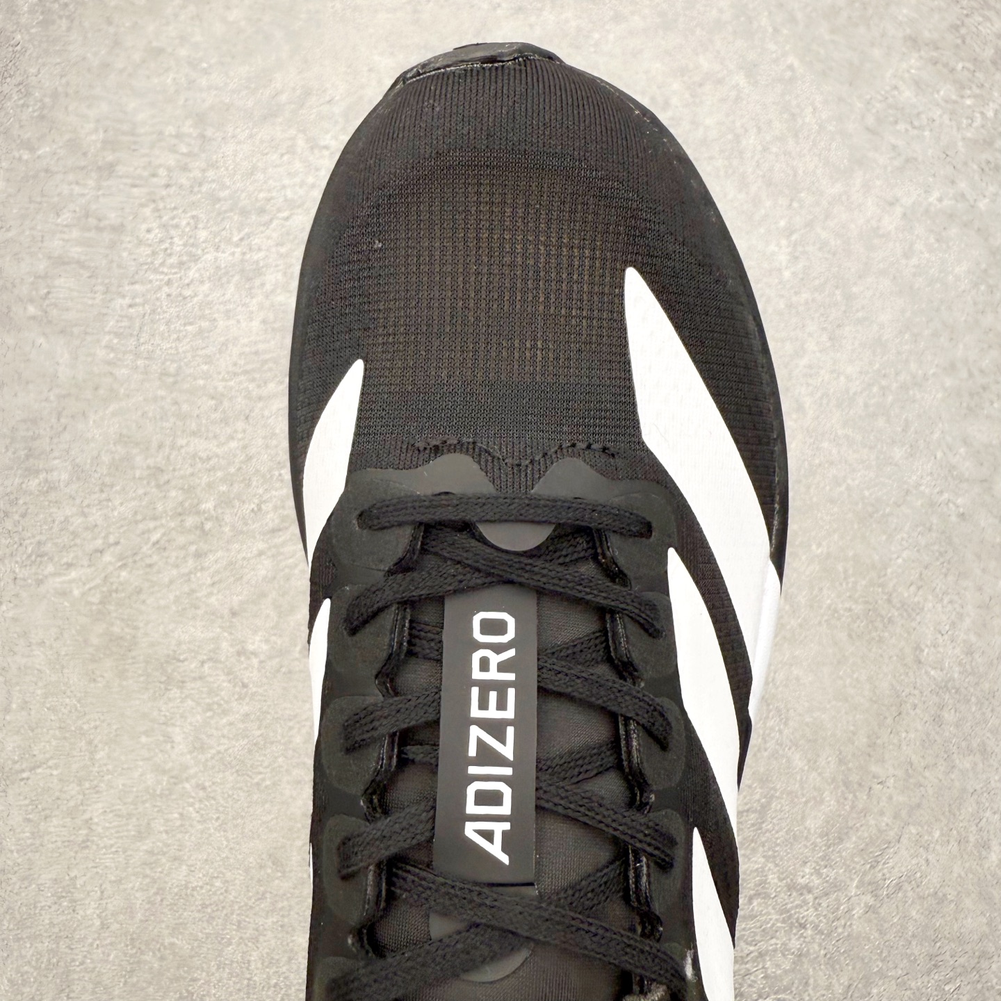 图片[4]-＃福利特价 AD Adizero EVO SL 马拉松竞速专业跑鞋 CELERMESH针织网面非常轻薄 纤维间的缝隙很大 可以保证跑步时的透气、排汗效果 鞋舌直接与两侧的内衬和鞋底连接在一起 在跑步过程中不会被鞋舌的左右移动所困扰 在标准鞋带孔的基础上再拓宽一组鞋带孔 适合不同脚型的需求 突破性 EnergyRods 技术，有助于跑者实现更好的成绩 中底独特的LIGHTSTRIKE PRO泡棉材质 微弹感觉在跑步过程中给予了良好的支撑体验 对于顶级精英和高水平进阶跑者来说 ADIOS PRO是一双值得信赖的竞速比赛用鞋 尺码：36 36.5 37.5 38 38.5 39 40 40.5 41 42 42.5 43 44 44.5 45-选品中心