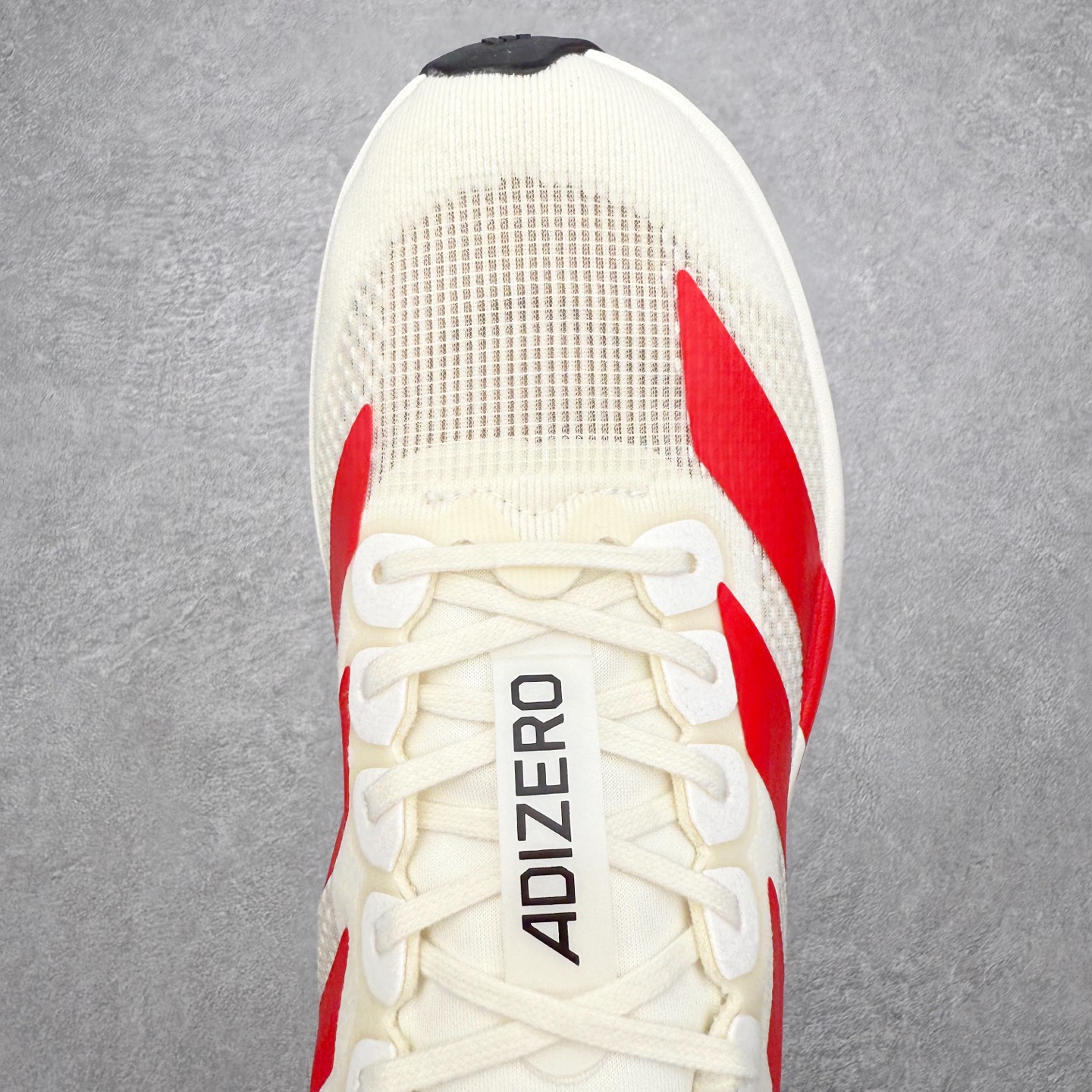 图片[4]-＃福利特价 AD Adizero EVO SL 马拉松竞速专业跑鞋 CELERMESH针织网面非常轻薄 纤维间的缝隙很大 可以保证跑步时的透气、排汗效果 鞋舌直接与两侧的内衬和鞋底连接在一起 在跑步过程中不会被鞋舌的左右移动所困扰 在标准鞋带孔的基础上再拓宽一组鞋带孔 适合不同脚型的需求 突破性 EnergyRods 技术，有助于跑者实现更好的成绩 中底独特的LIGHTSTRIKE PRO泡棉材质 微弹感觉在跑步过程中给予了良好的支撑体验 对于顶级精英和高水平进阶跑者来说 ADIOS PRO是一双值得信赖的竞速比赛用鞋 尺码：36 36.5 37.5 38 38.5 39 40 40.5 41 42 42.5 43 44 44.5 45-选品中心