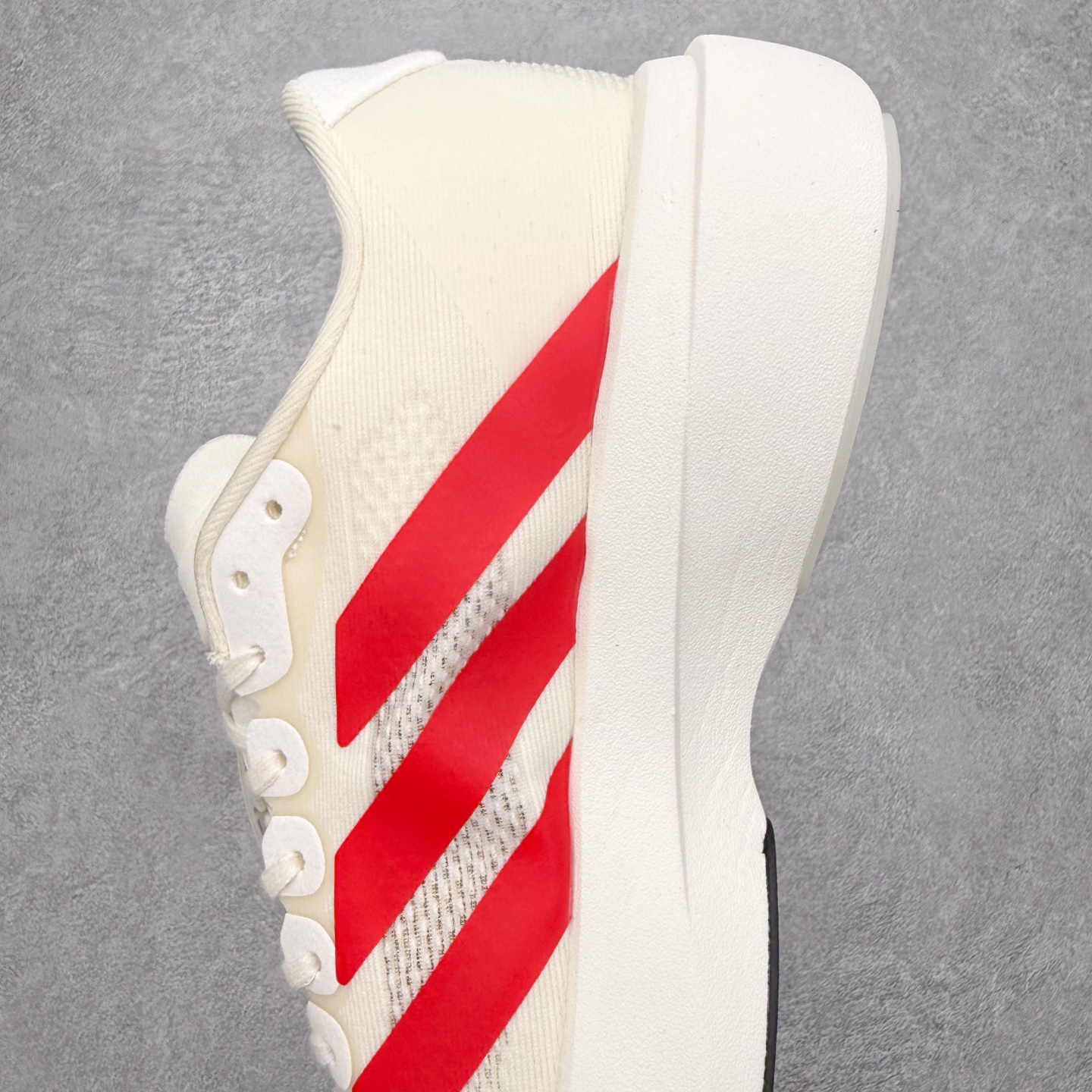 图片[7]-＃福利特价 AD Adizero EVO SL 马拉松竞速专业跑鞋 CELERMESH针织网面非常轻薄 纤维间的缝隙很大 可以保证跑步时的透气、排汗效果 鞋舌直接与两侧的内衬和鞋底连接在一起 在跑步过程中不会被鞋舌的左右移动所困扰 在标准鞋带孔的基础上再拓宽一组鞋带孔 适合不同脚型的需求 突破性 EnergyRods 技术，有助于跑者实现更好的成绩 中底独特的LIGHTSTRIKE PRO泡棉材质 微弹感觉在跑步过程中给予了良好的支撑体验 对于顶级精英和高水平进阶跑者来说 ADIOS PRO是一双值得信赖的竞速比赛用鞋 尺码：36 36.5 37.5 38 38.5 39 40 40.5 41 42 42.5 43 44 44.5 45-选品中心