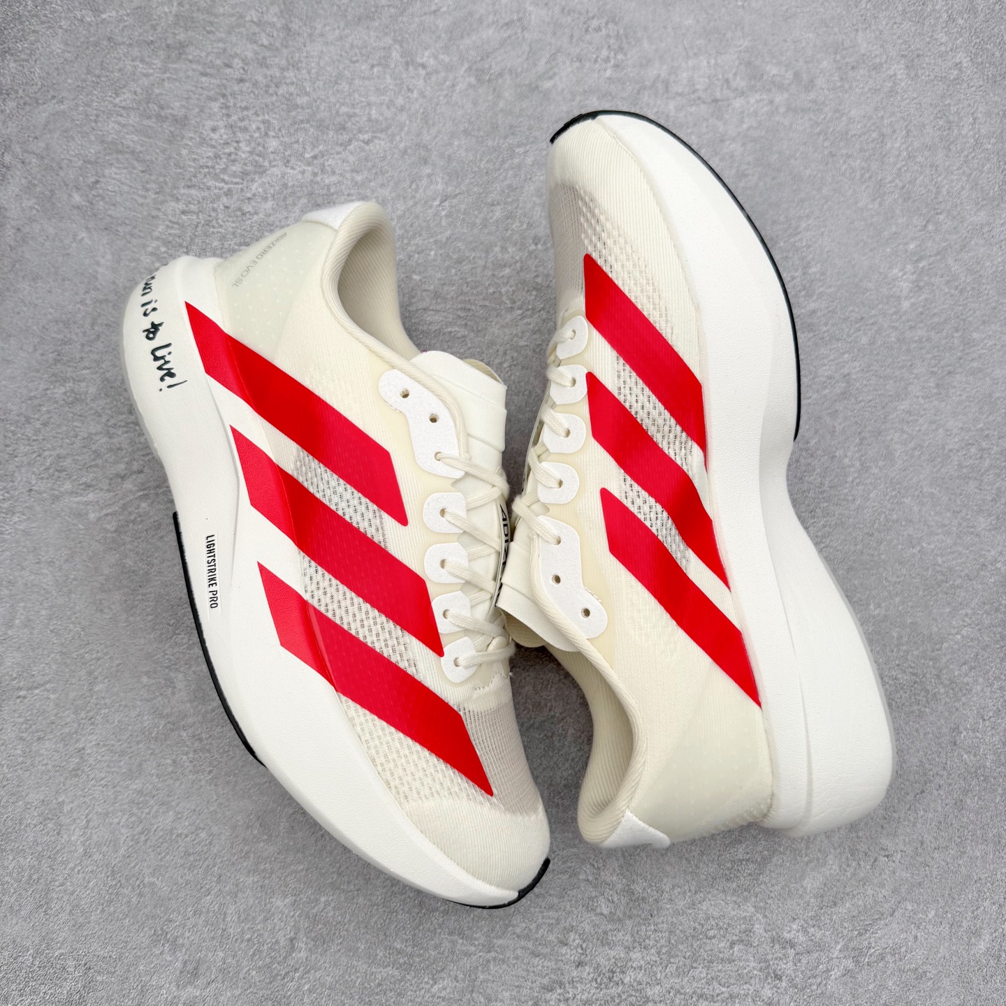 图片[3]-＃福利特价 AD Adizero EVO SL 马拉松竞速专业跑鞋 CELERMESH针织网面非常轻薄 纤维间的缝隙很大 可以保证跑步时的透气、排汗效果 鞋舌直接与两侧的内衬和鞋底连接在一起 在跑步过程中不会被鞋舌的左右移动所困扰 在标准鞋带孔的基础上再拓宽一组鞋带孔 适合不同脚型的需求 突破性 EnergyRods 技术，有助于跑者实现更好的成绩 中底独特的LIGHTSTRIKE PRO泡棉材质 微弹感觉在跑步过程中给予了良好的支撑体验 对于顶级精英和高水平进阶跑者来说 ADIOS PRO是一双值得信赖的竞速比赛用鞋 尺码：36 36.5 37.5 38 38.5 39 40 40.5 41 42 42.5 43 44 44.5 45-选品中心