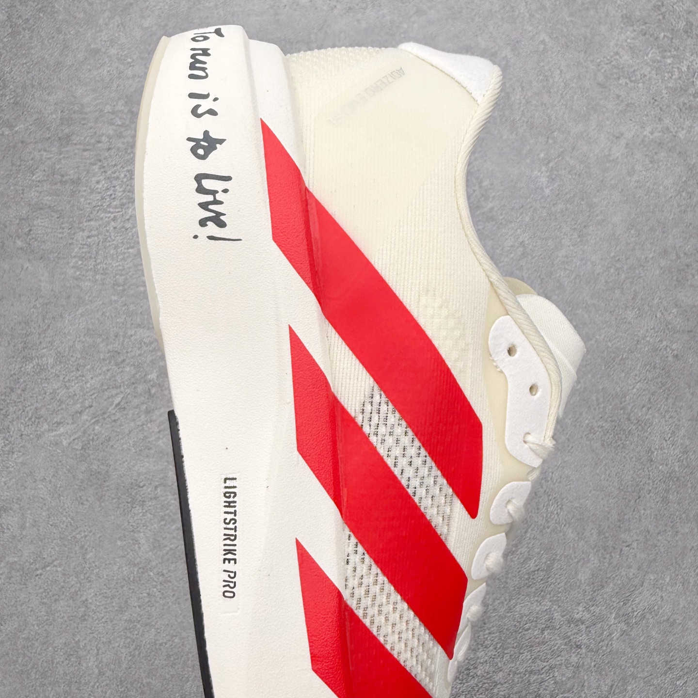 图片[6]-＃福利特价 AD Adizero EVO SL 马拉松竞速专业跑鞋 CELERMESH针织网面非常轻薄 纤维间的缝隙很大 可以保证跑步时的透气、排汗效果 鞋舌直接与两侧的内衬和鞋底连接在一起 在跑步过程中不会被鞋舌的左右移动所困扰 在标准鞋带孔的基础上再拓宽一组鞋带孔 适合不同脚型的需求 突破性 EnergyRods 技术，有助于跑者实现更好的成绩 中底独特的LIGHTSTRIKE PRO泡棉材质 微弹感觉在跑步过程中给予了良好的支撑体验 对于顶级精英和高水平进阶跑者来说 ADIOS PRO是一双值得信赖的竞速比赛用鞋 尺码：36 36.5 37.5 38 38.5 39 40 40.5 41 42 42.5 43 44 44.5 45-选品中心