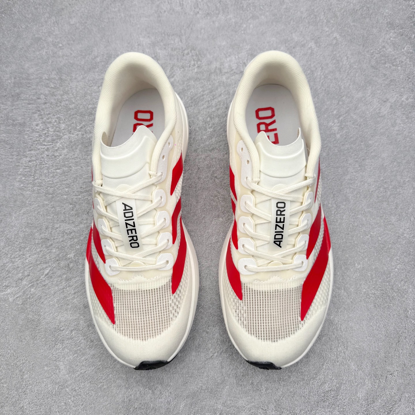 图片[2]-＃福利特价 AD Adizero EVO SL 马拉松竞速专业跑鞋 CELERMESH针织网面非常轻薄 纤维间的缝隙很大 可以保证跑步时的透气、排汗效果 鞋舌直接与两侧的内衬和鞋底连接在一起 在跑步过程中不会被鞋舌的左右移动所困扰 在标准鞋带孔的基础上再拓宽一组鞋带孔 适合不同脚型的需求 突破性 EnergyRods 技术，有助于跑者实现更好的成绩 中底独特的LIGHTSTRIKE PRO泡棉材质 微弹感觉在跑步过程中给予了良好的支撑体验 对于顶级精英和高水平进阶跑者来说 ADIOS PRO是一双值得信赖的竞速比赛用鞋 尺码：36 36.5 37.5 38 38.5 39 40 40.5 41 42 42.5 43 44 44.5 45-选品中心