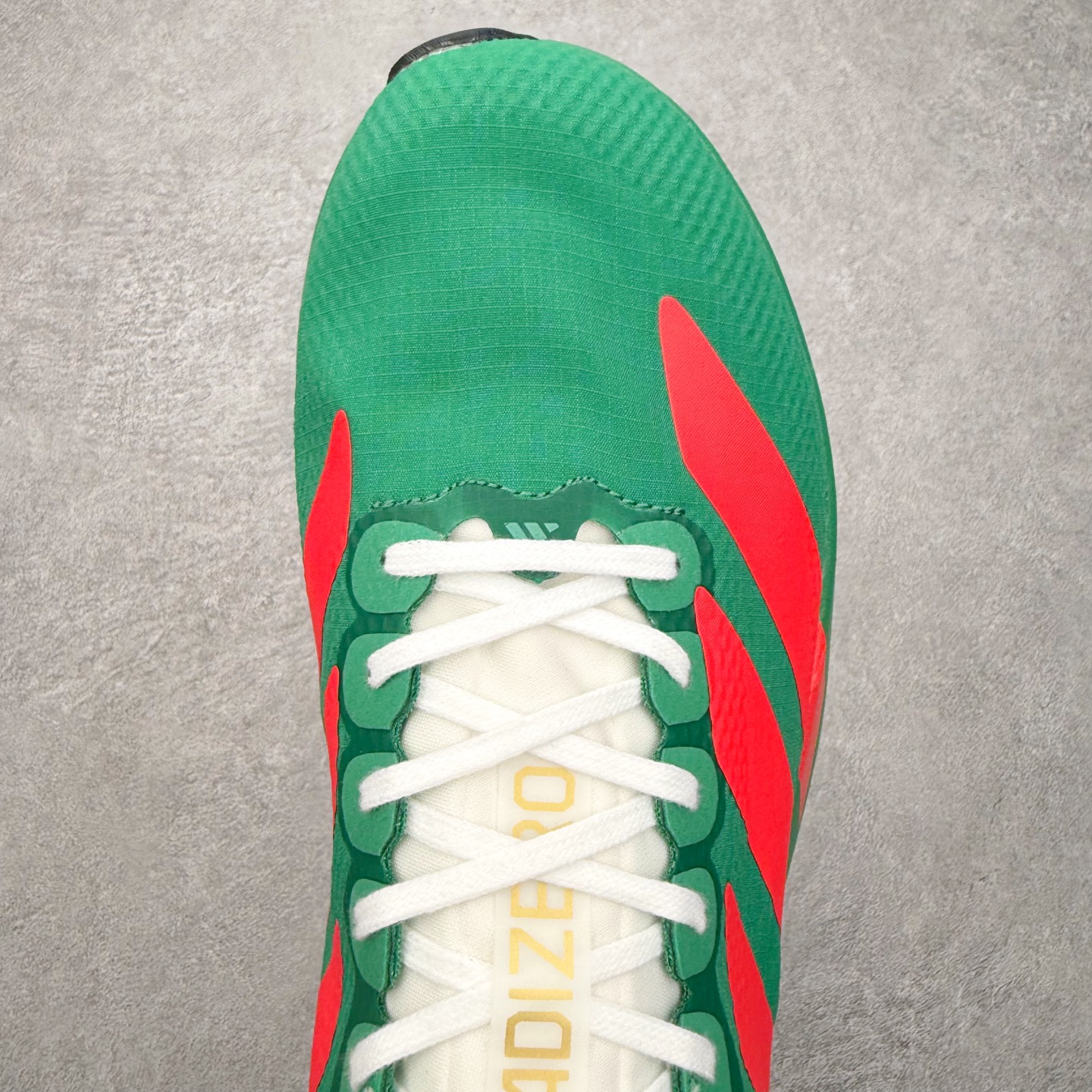 图片[4]-AD Adizero EVO SL WOVEN 马拉松竞速专业跑鞋 CELERMESH针织网面非常轻薄 纤维间的缝隙很大 可以保证跑步时的透气、排汗效果 鞋舌直接与两侧的内衬和鞋底连接在一起 在跑步过程中不会被鞋舌的左右移动所困扰 在标准鞋带孔的基础上再拓宽一组鞋带孔 适合不同脚型的需求 突破性 EnergyRods 技术，有助于跑者实现更好的成绩 中底独特的LIGHTSTRIKE PRO泡棉材质 微弹感觉在跑步过程中给予了良好的支撑体验 对于顶级精英和高水平进阶跑者来说 ADIOS PRO是一双值得信赖的竞速比赛用鞋 尺码：36 36.5 37.5 38 38.5 39 40 40.5 41 42 42.5 43 44 44.5 45-选品中心