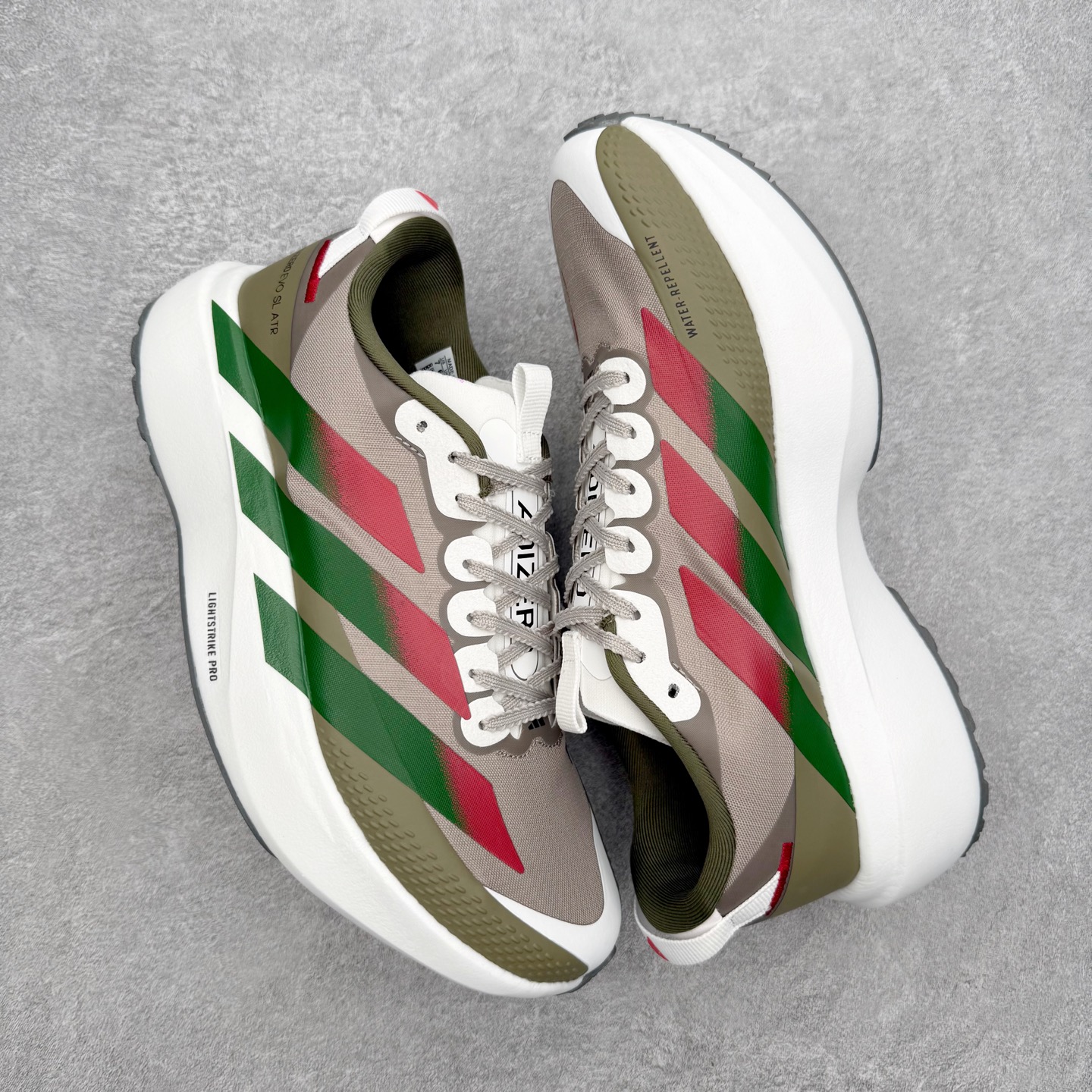 图片[3]-AD Adizero EVO SL ATR M 马拉松竞速专业跑鞋 CELERMESH针织网面非常轻薄 纤维间的缝隙很大 可以保证跑步时的透气、排汗效果 鞋舌直接与两侧的内衬和鞋底连接在一起 在跑步过程中不会被鞋舌的左右移动所困扰 在标准鞋带孔的基础上再拓宽一组鞋带孔 适合不同脚型的需求 突破性 EnergyRods 技术，有助于跑者实现更好的成绩 中底独特的LIGHTSTRIKE PRO泡棉材质 微弹感觉在跑步过程中给予了良好的支撑体验 对于顶级精英和高水平进阶跑者来说 ADIOS PRO是一双值得信赖的竞速比赛用鞋 尺码：36 36.5 37.5 38 38.5 39 40 40.5 41 42 42.5 43 44 44.5 45-选品中心