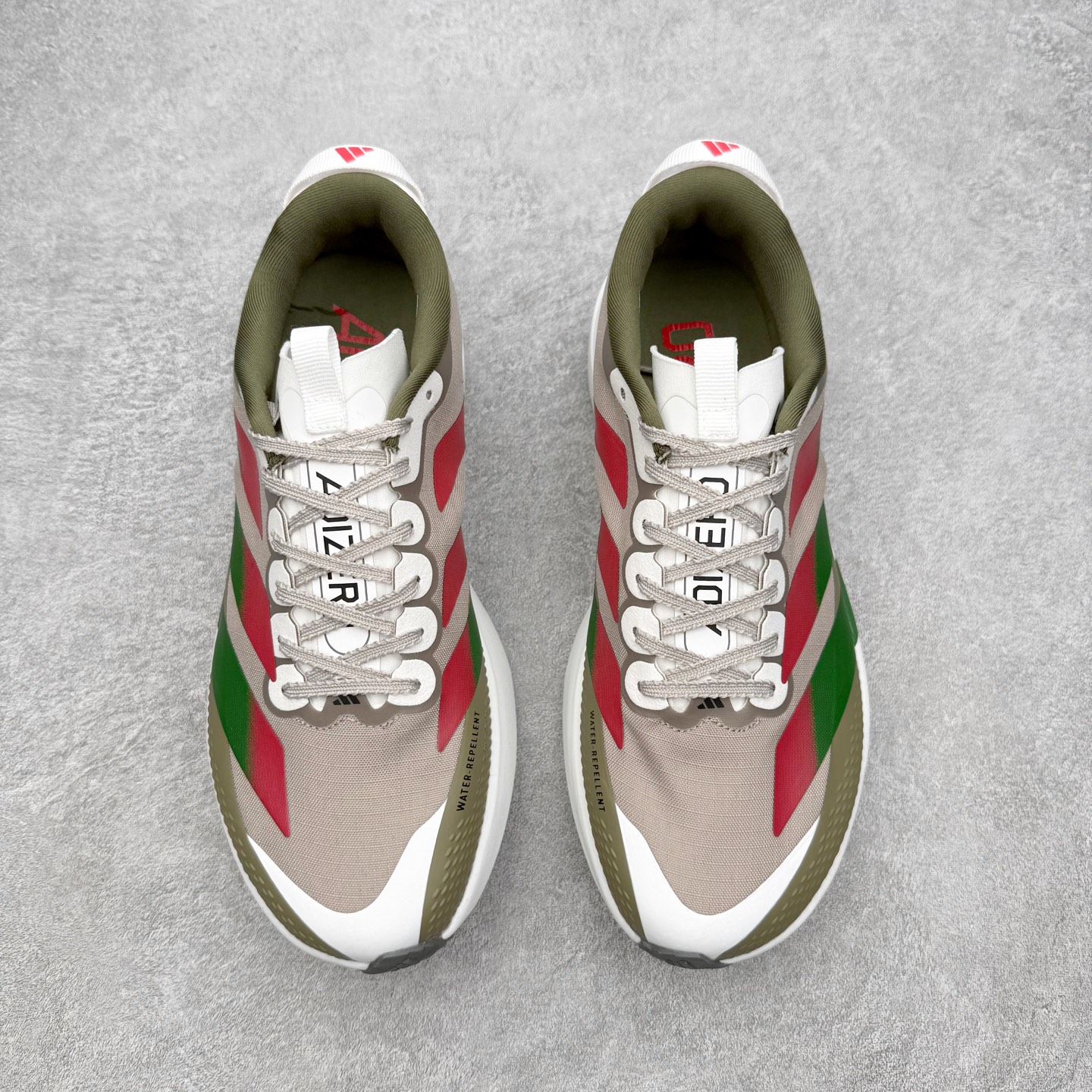 图片[2]-AD Adizero EVO SL ATR M 马拉松竞速专业跑鞋 CELERMESH针织网面非常轻薄 纤维间的缝隙很大 可以保证跑步时的透气、排汗效果 鞋舌直接与两侧的内衬和鞋底连接在一起 在跑步过程中不会被鞋舌的左右移动所困扰 在标准鞋带孔的基础上再拓宽一组鞋带孔 适合不同脚型的需求 突破性 EnergyRods 技术，有助于跑者实现更好的成绩 中底独特的LIGHTSTRIKE PRO泡棉材质 微弹感觉在跑步过程中给予了良好的支撑体验 对于顶级精英和高水平进阶跑者来说 ADIOS PRO是一双值得信赖的竞速比赛用鞋 尺码：36 36.5 37.5 38 38.5 39 40 40.5 41 42 42.5 43 44 44.5 45-选品中心